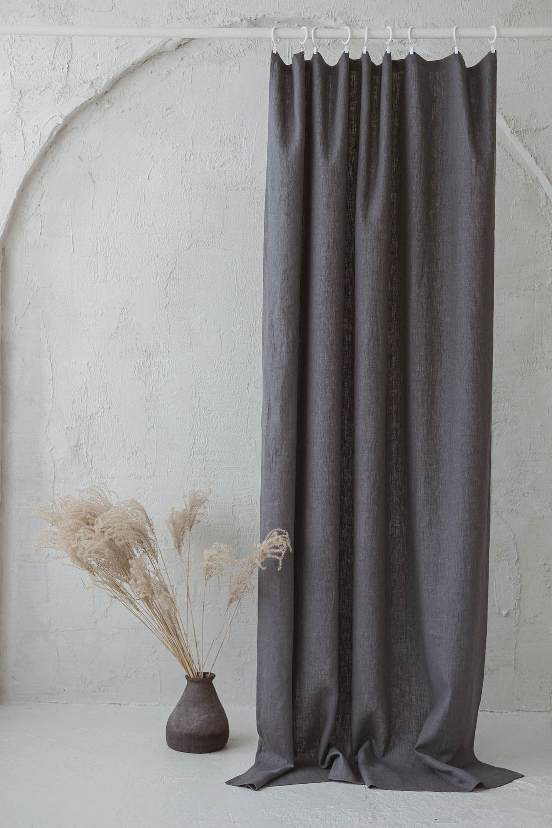 Heavyweight charcoal gray linen curtain with simple hem, for clips