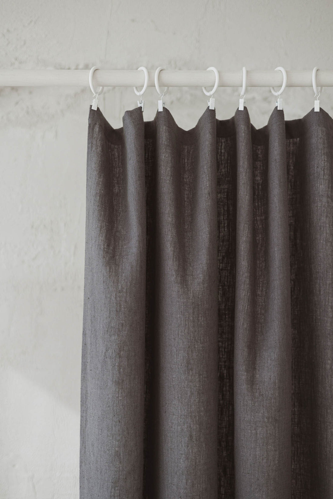 Heavyweight charcoal gray linen curtain with simple hem, for clips
