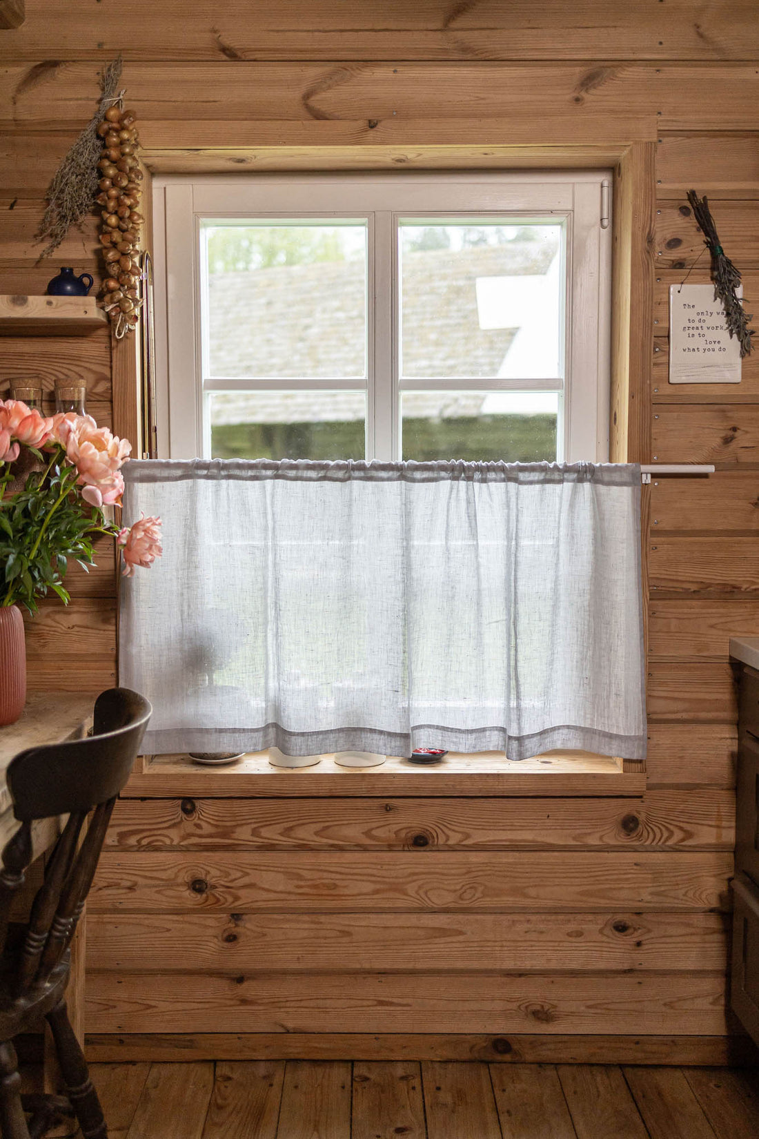 Sheer linen cafe curtain in rainy day