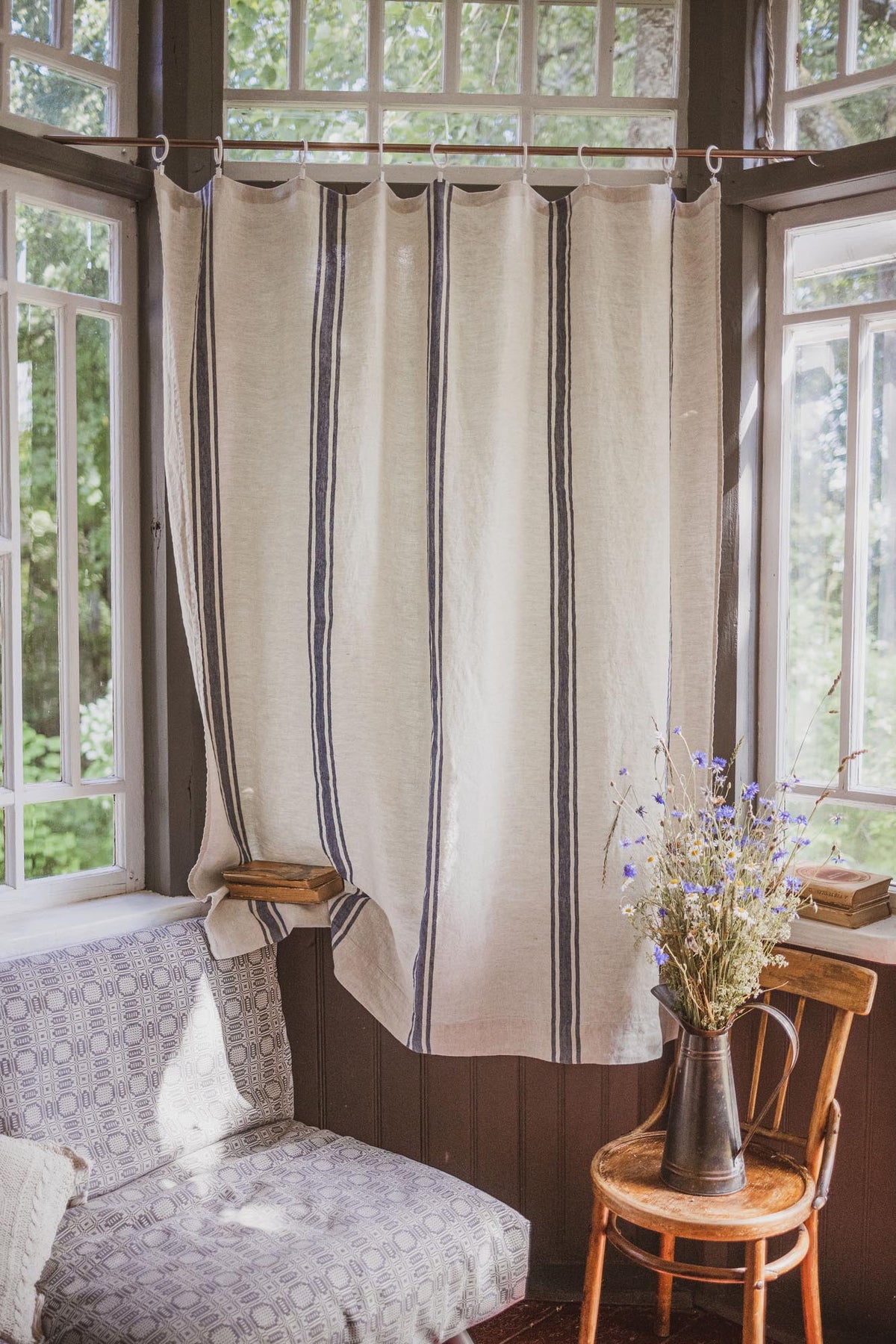 Linen curtain with classic blue stripes and simple hem, for clips