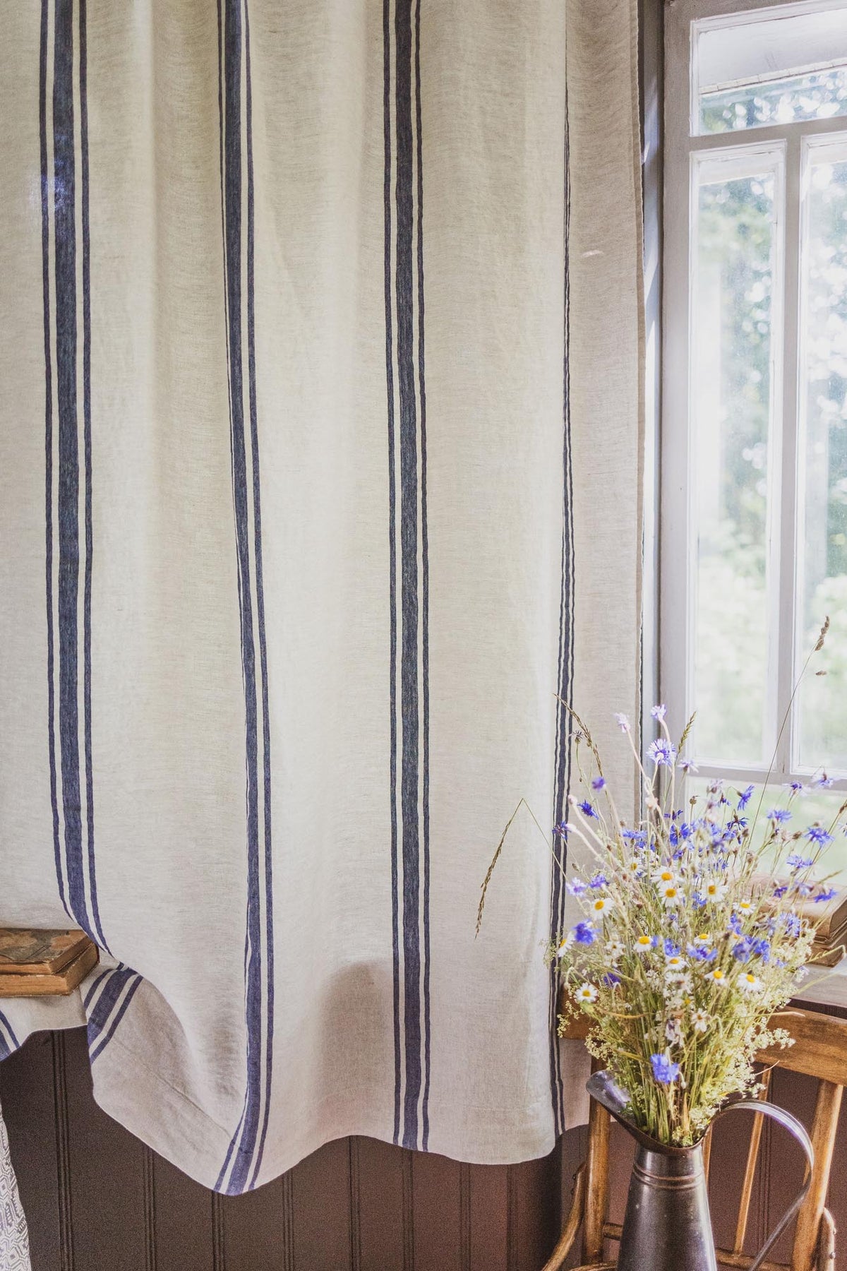 Linen curtain with classic blue stripes and simple hem, for clips