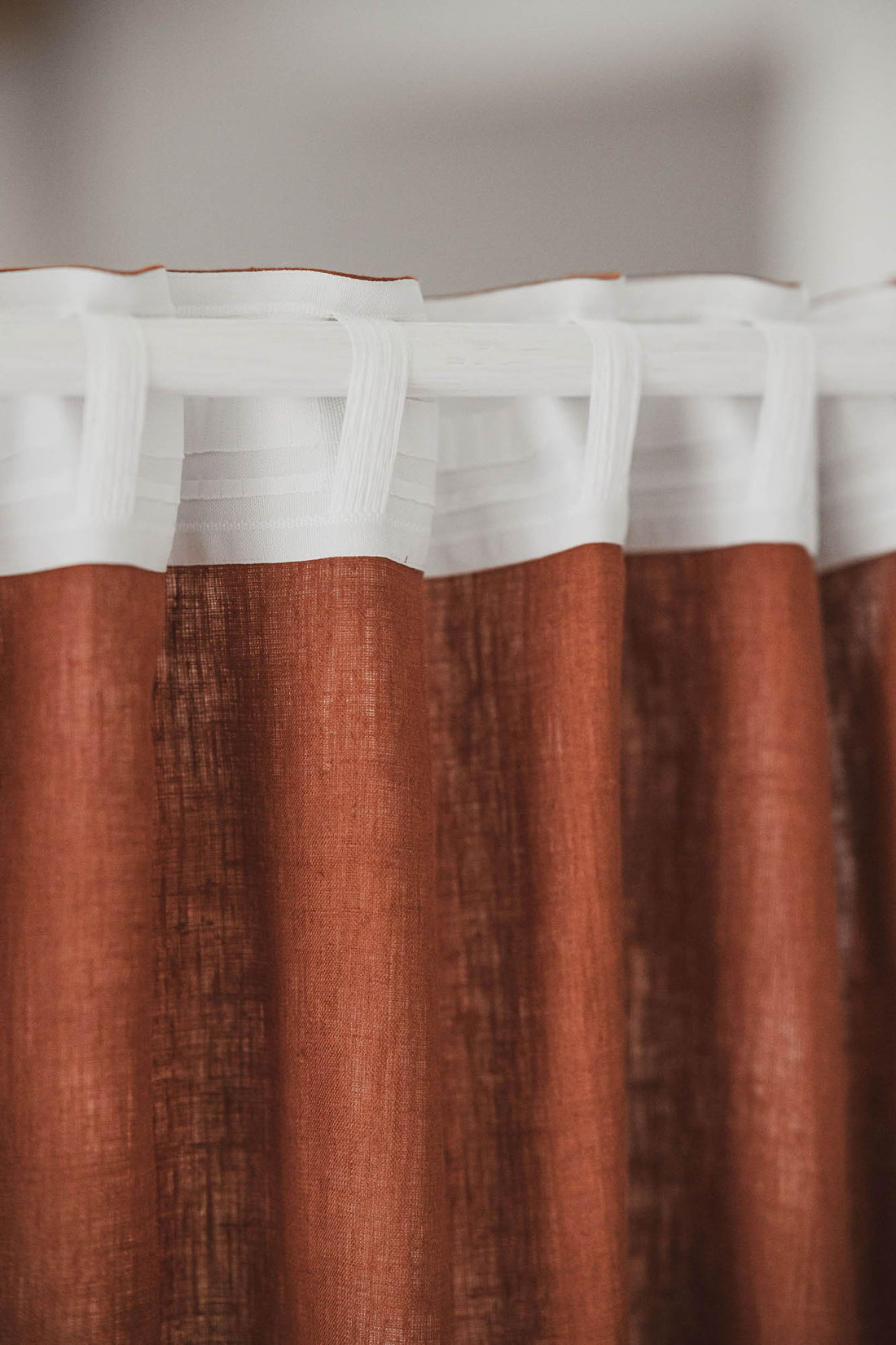 Burnt orange linen curtain with multifunctional heading tape
