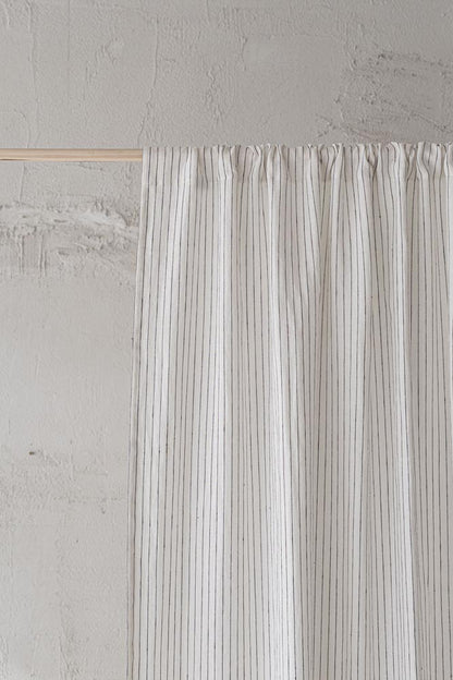 White linen curtain with black stripes