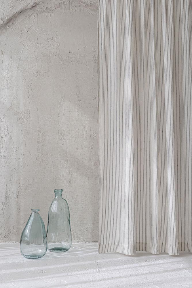 White linen curtain with black stripes