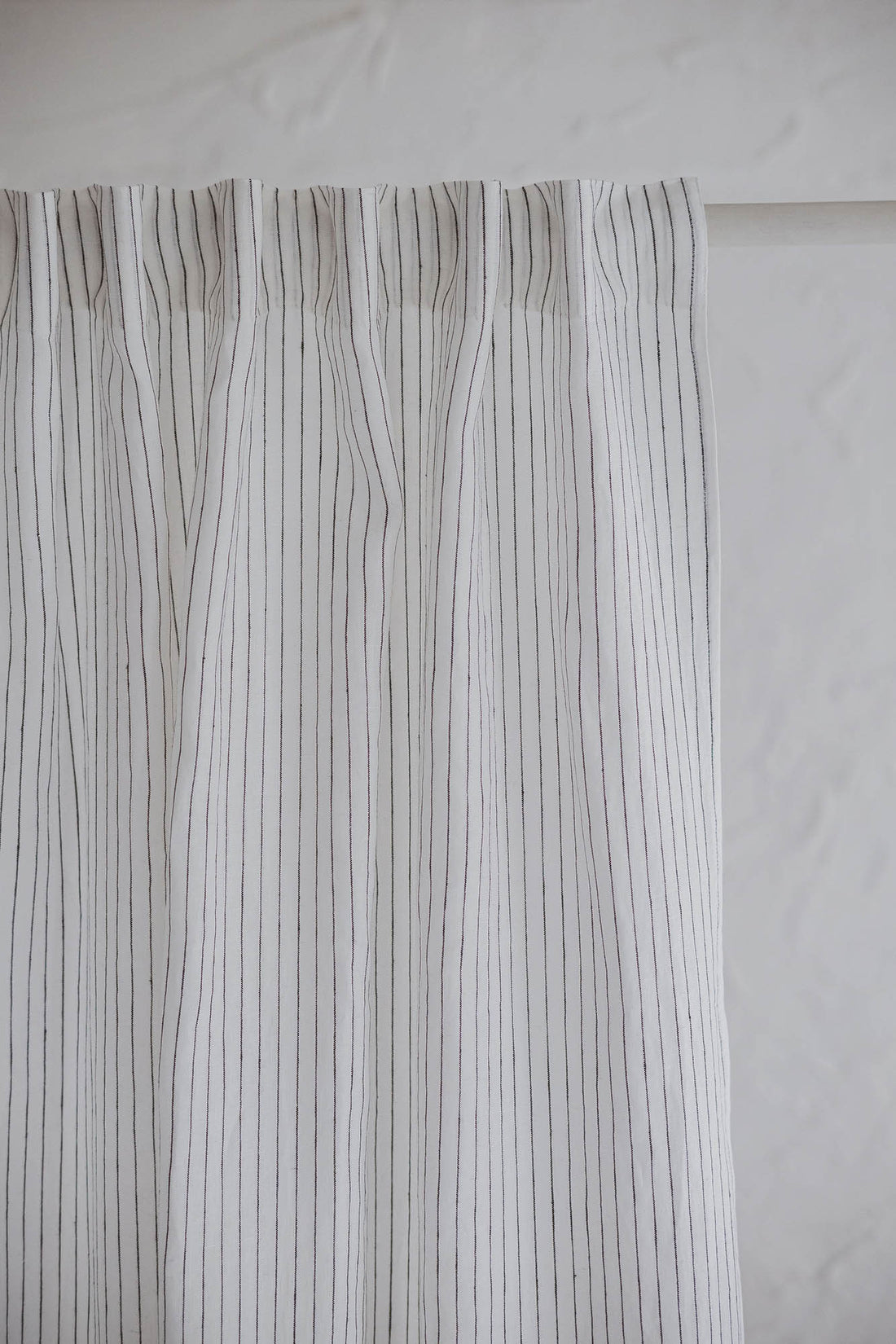 White and black striped linen curtain with multifunctional heading tape