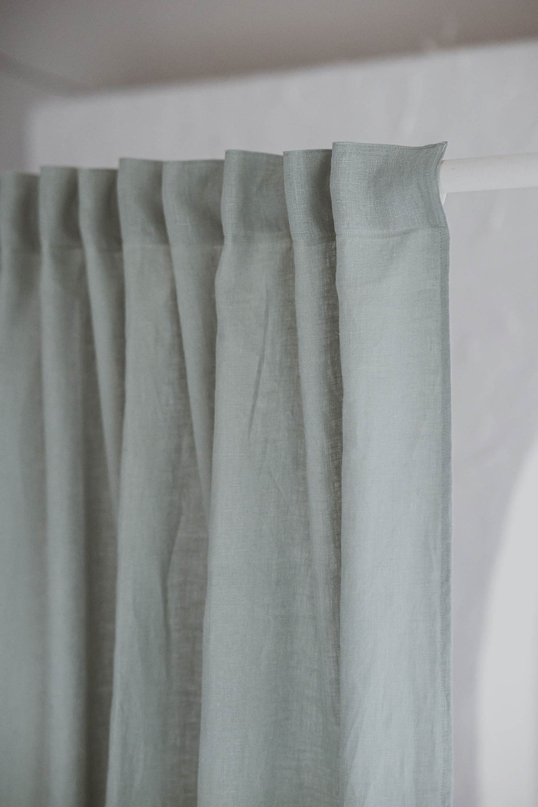 Frosty green linen curtain with multifunctional heading tape