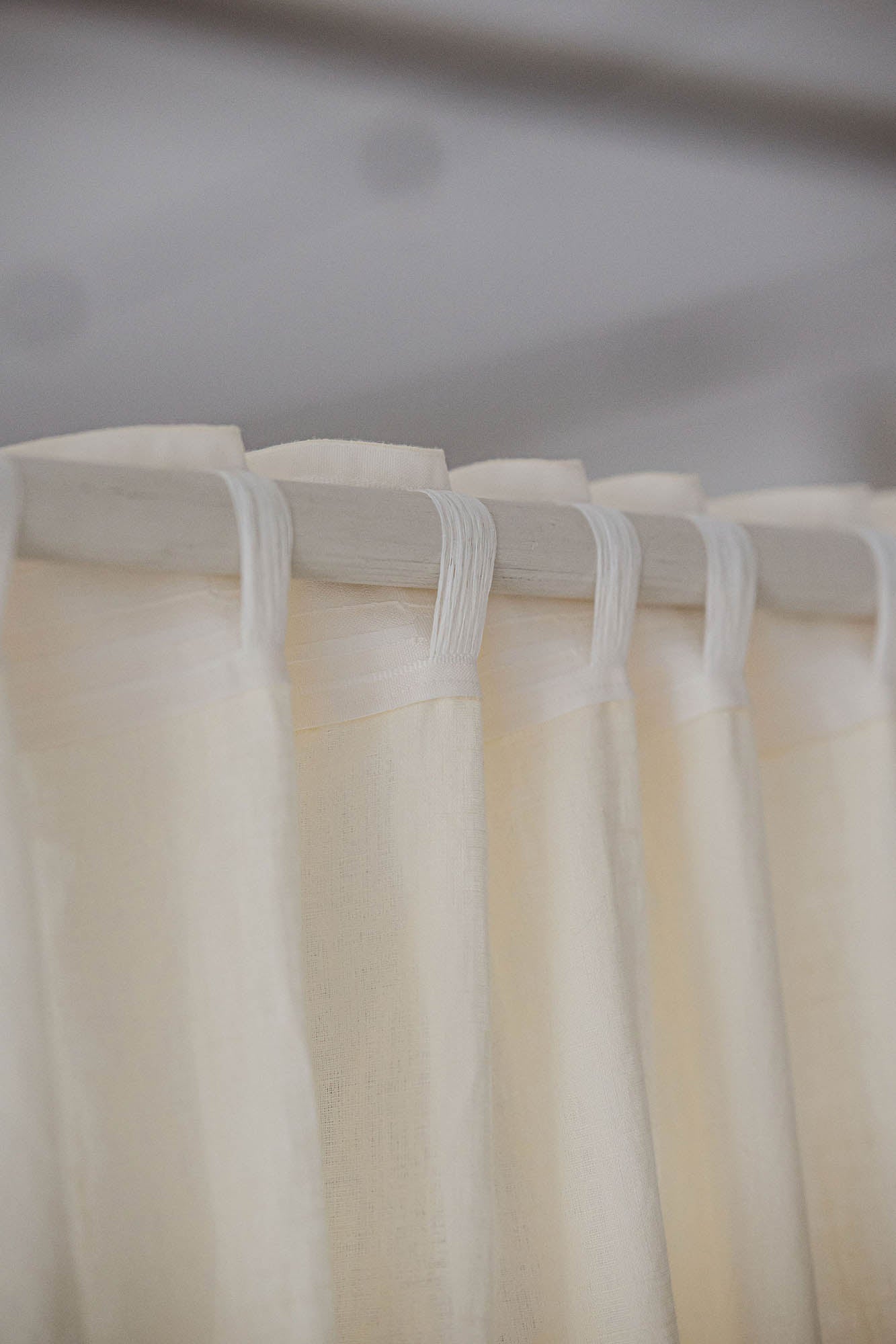 Cream linen curtain with multifunctional heading tape