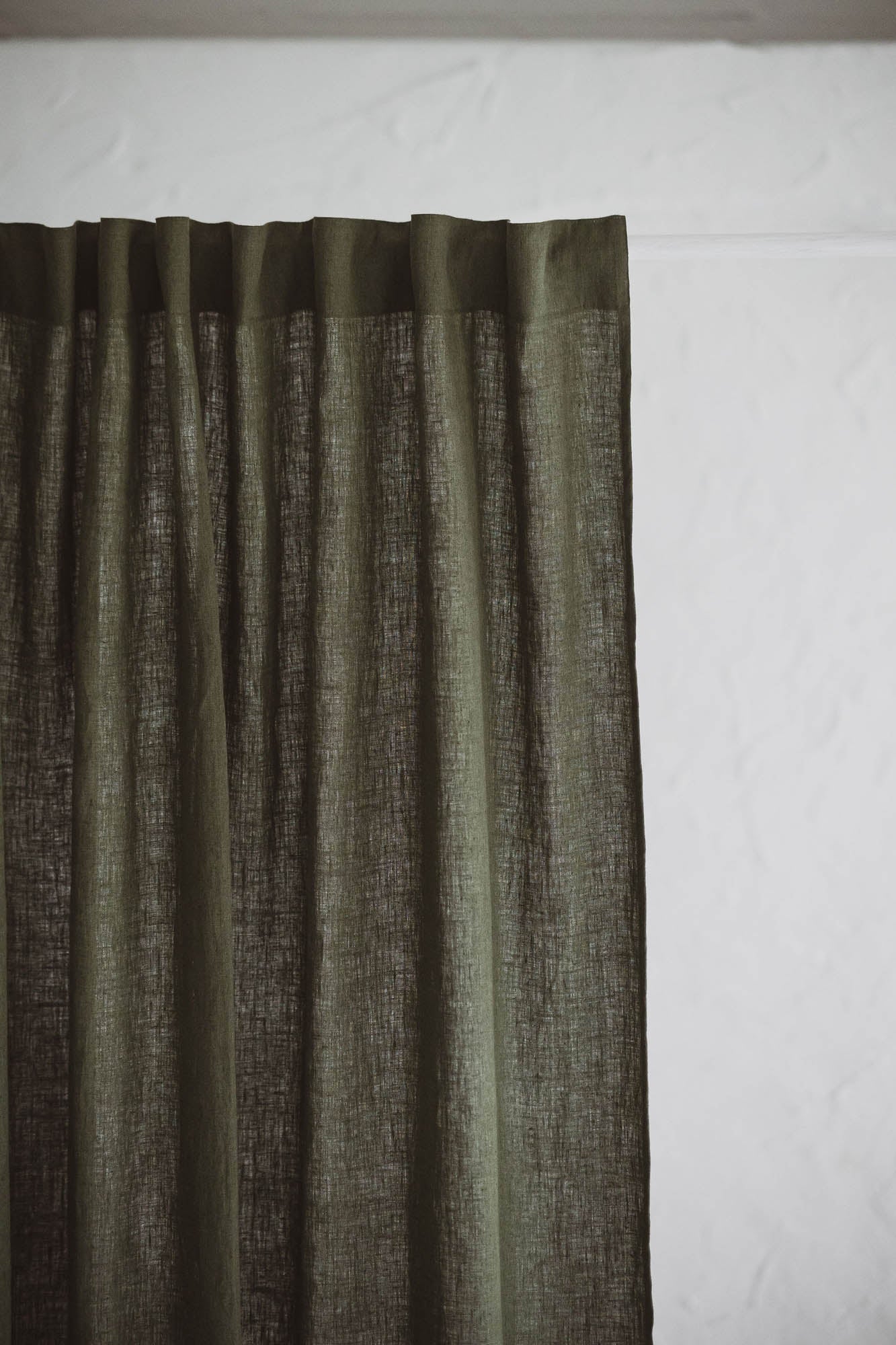 Forest green linen curtain with multifunctional heading tape