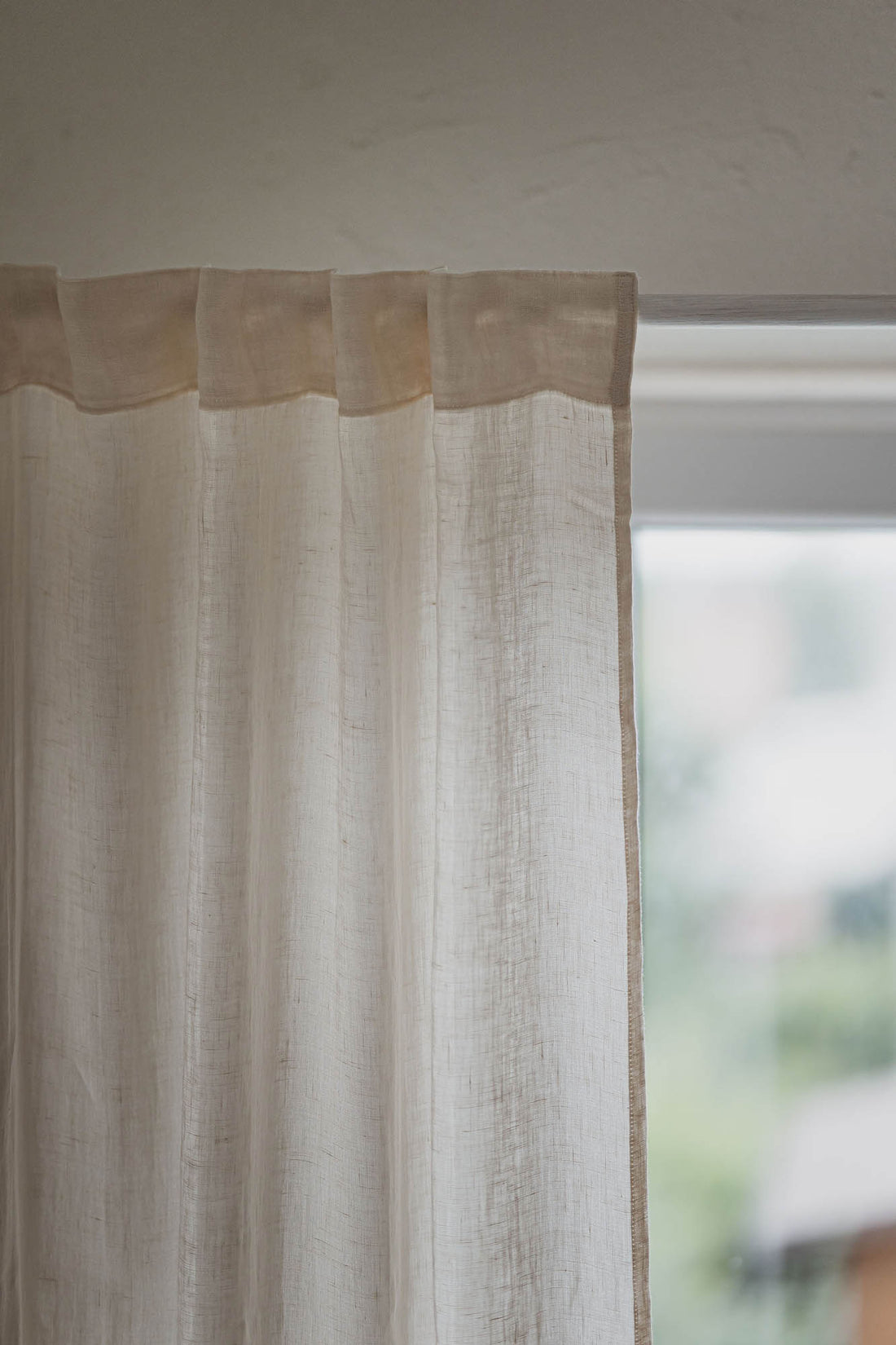 Light cream sheer linen curtain with multifunctional heading tape