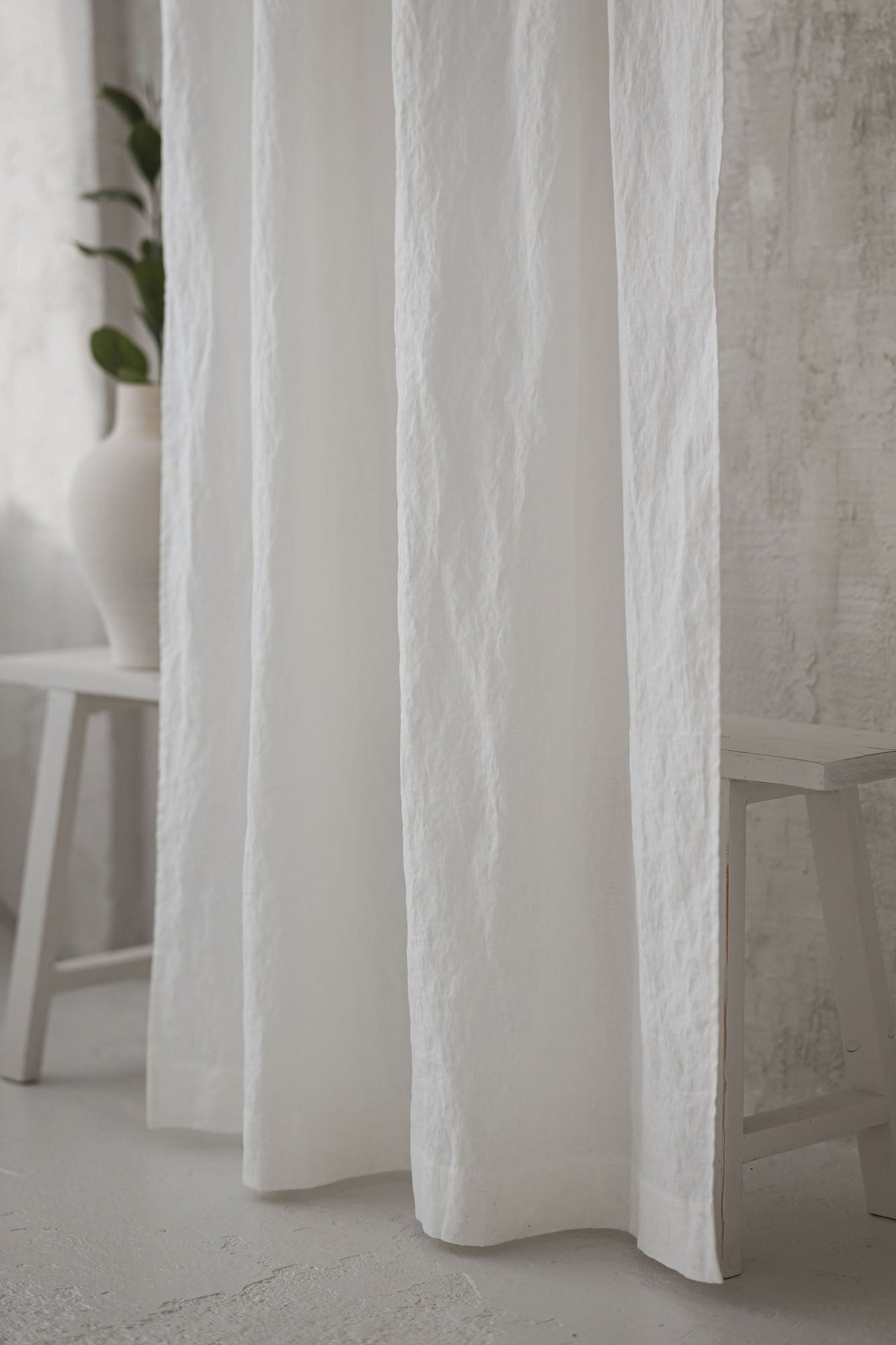 Tie top off white linen curtain