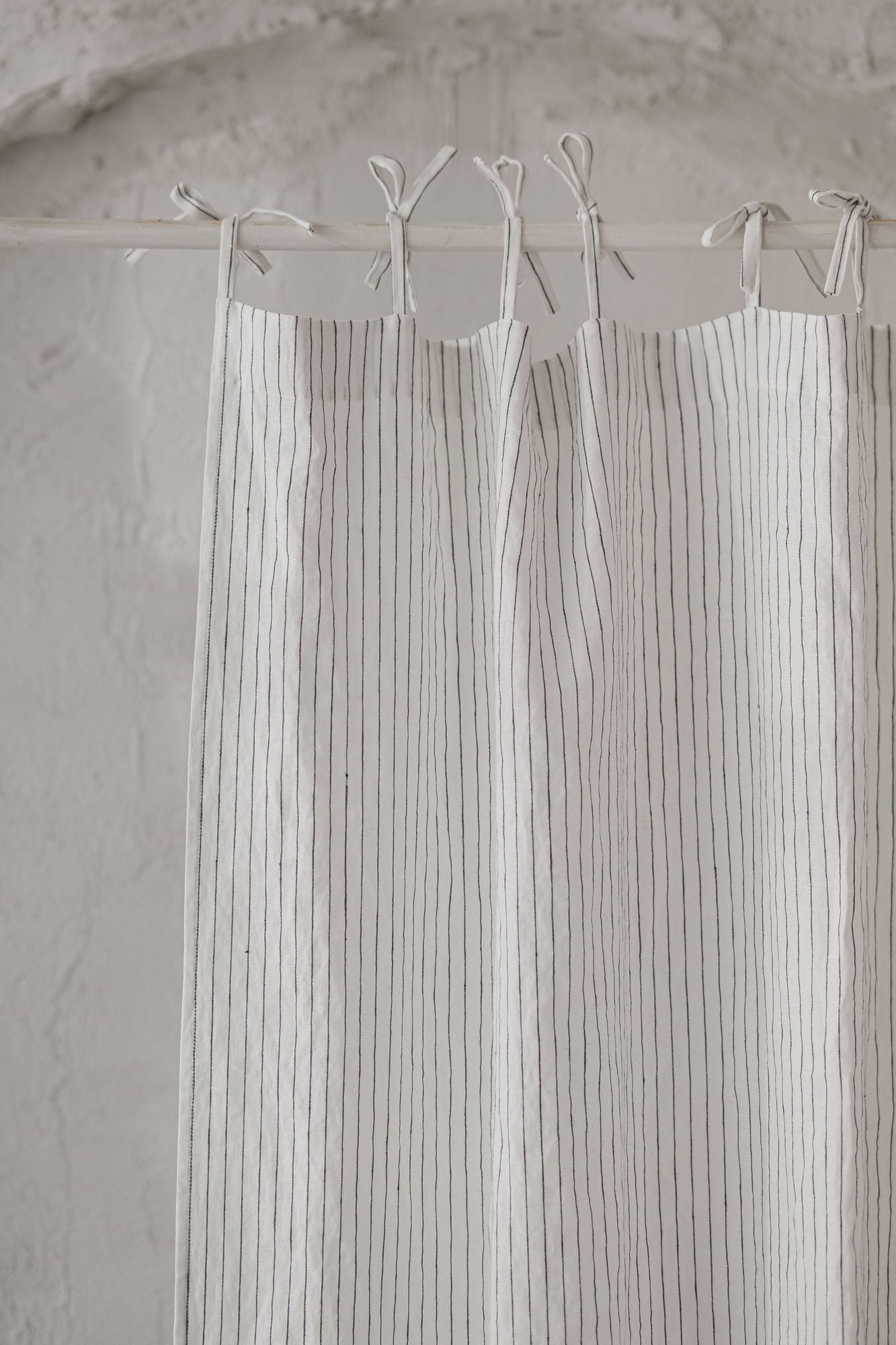 Tie top white linen curtain with black stripes