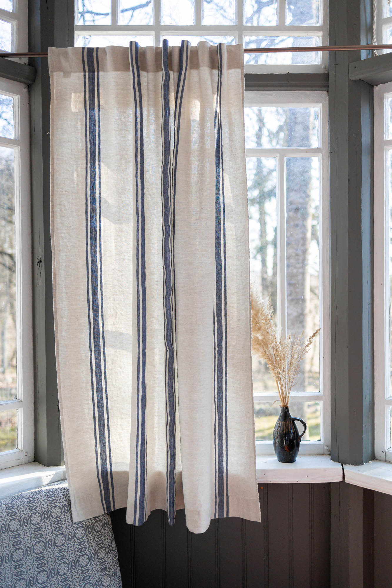Linen curtain with blue stripes and multifunctional heading tape