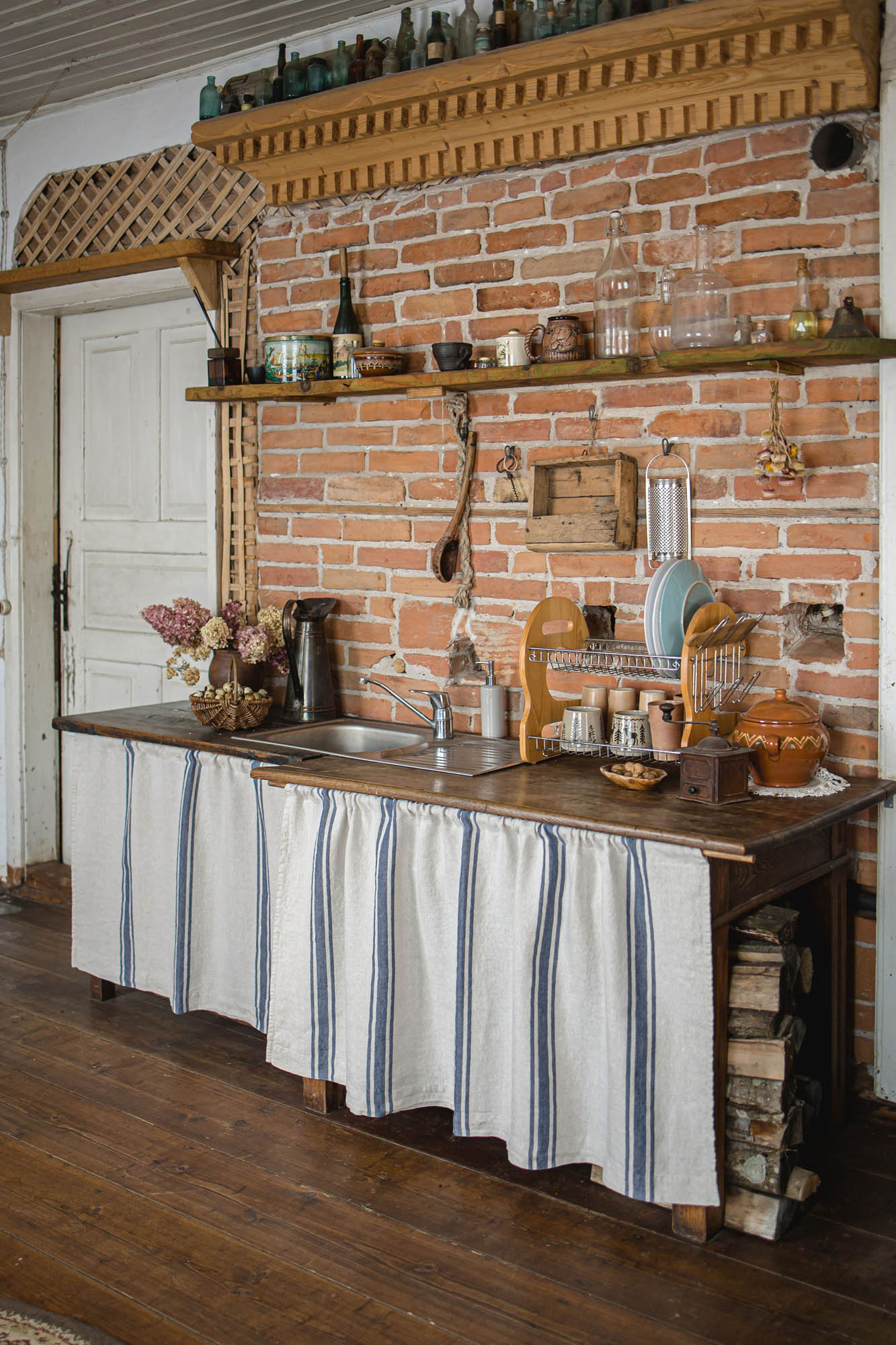 Linen cabinet curtain with blue stripes
