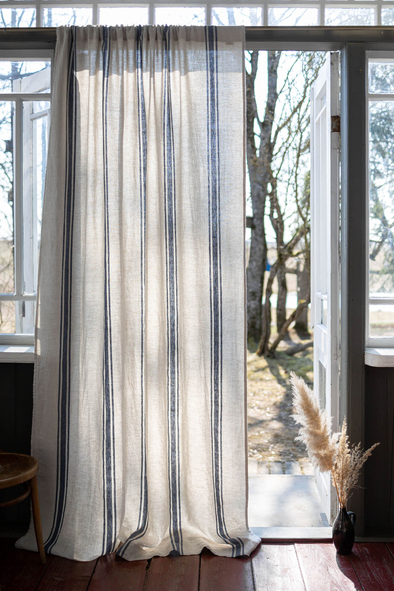 Linen curtain with blue stripes