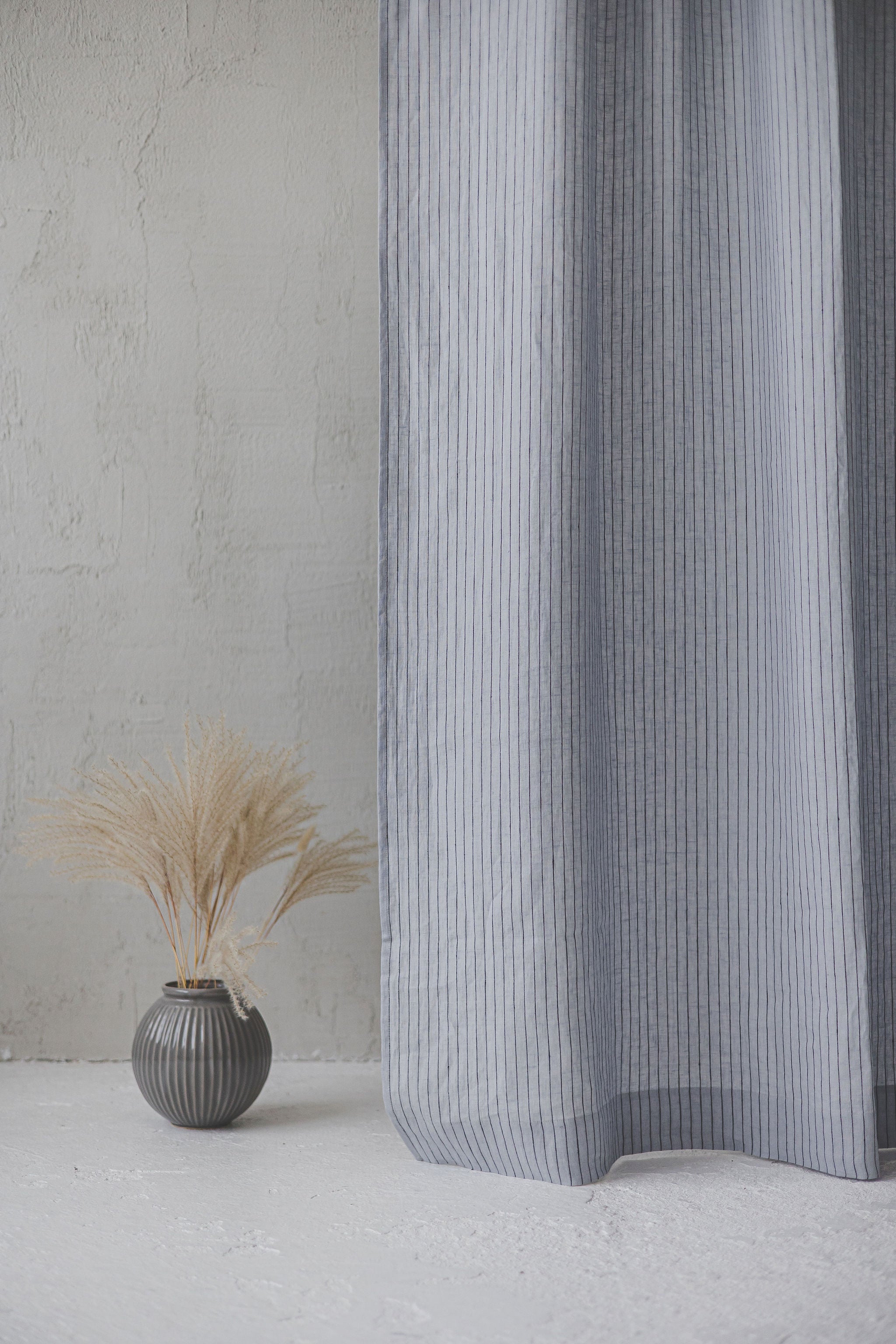 Grey linen curtain with black stripes