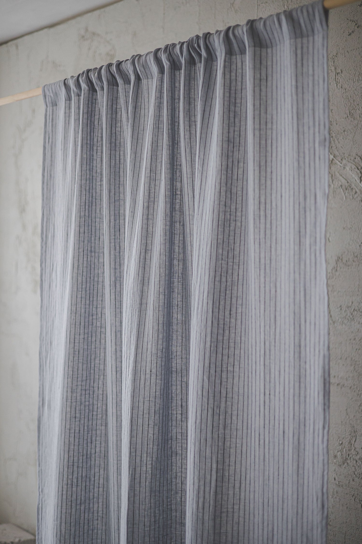 Grey linen curtain with black stripes