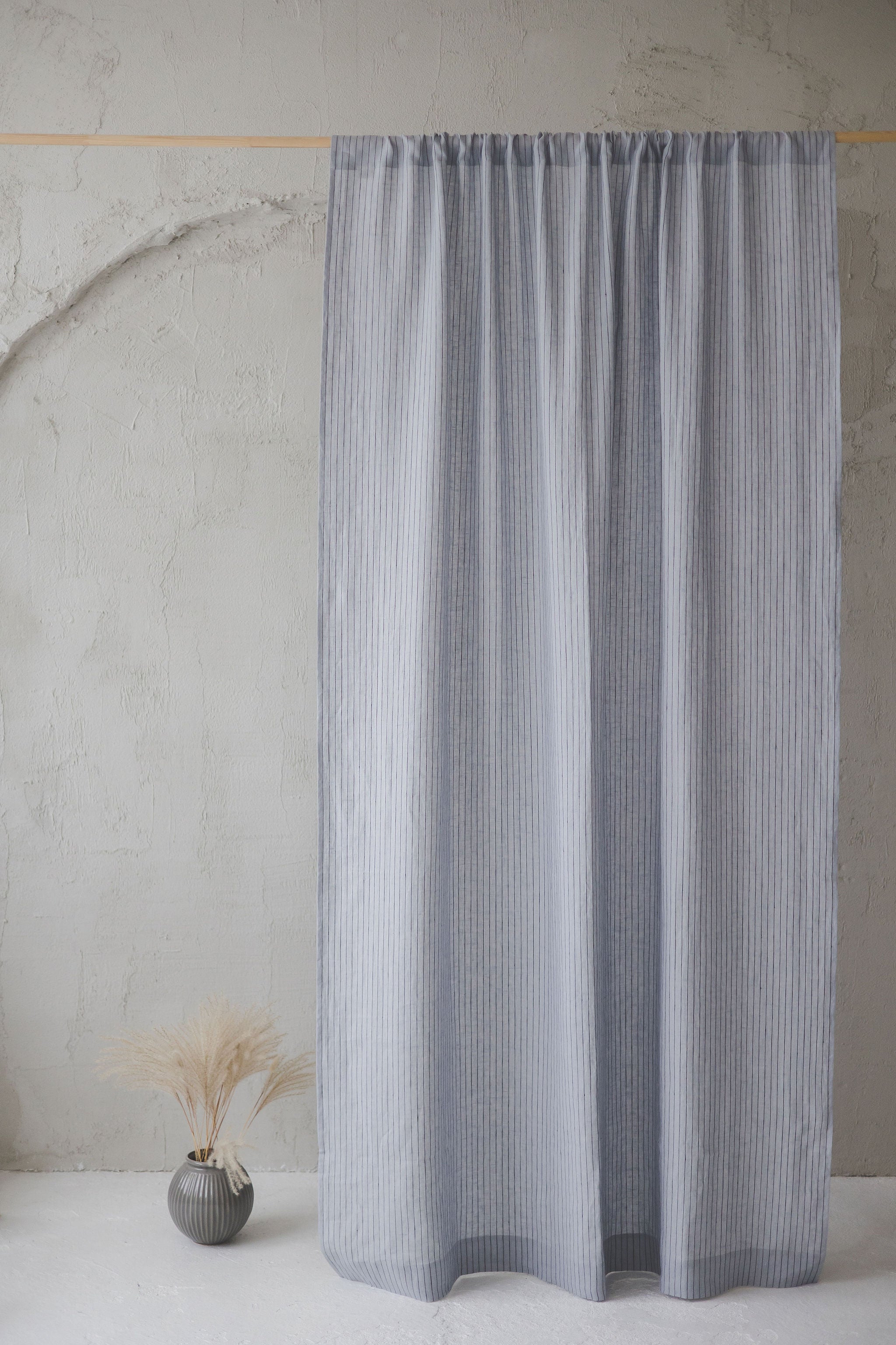 Grey linen curtain with black stripes