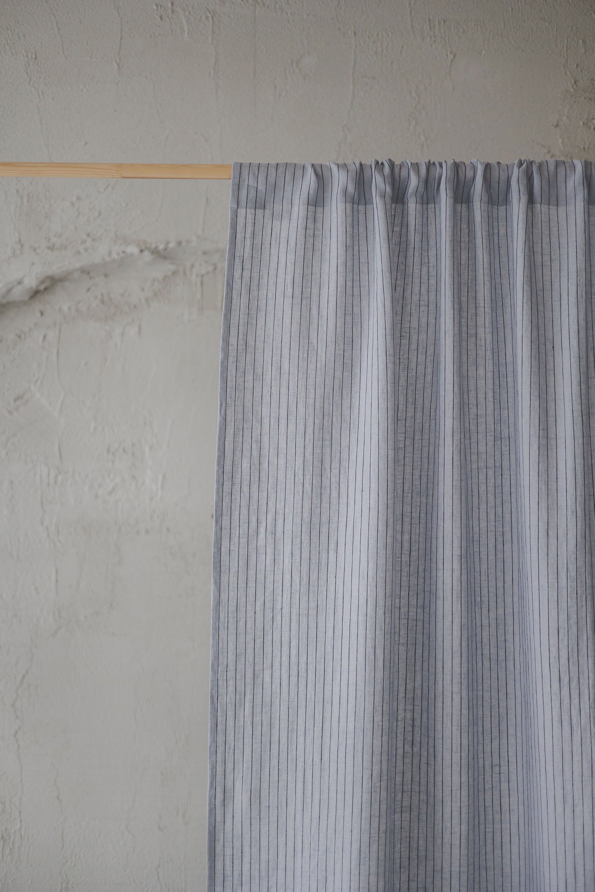 Grey linen curtain with black stripes