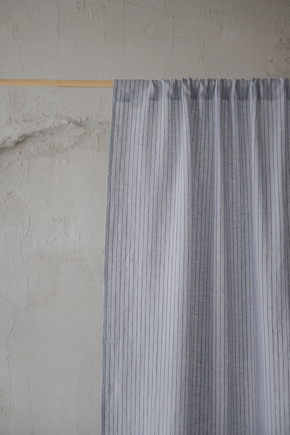 Grey linen curtain with black stripes