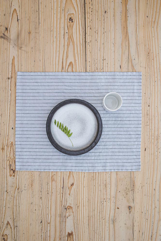 Grey linen placemats with black stripes