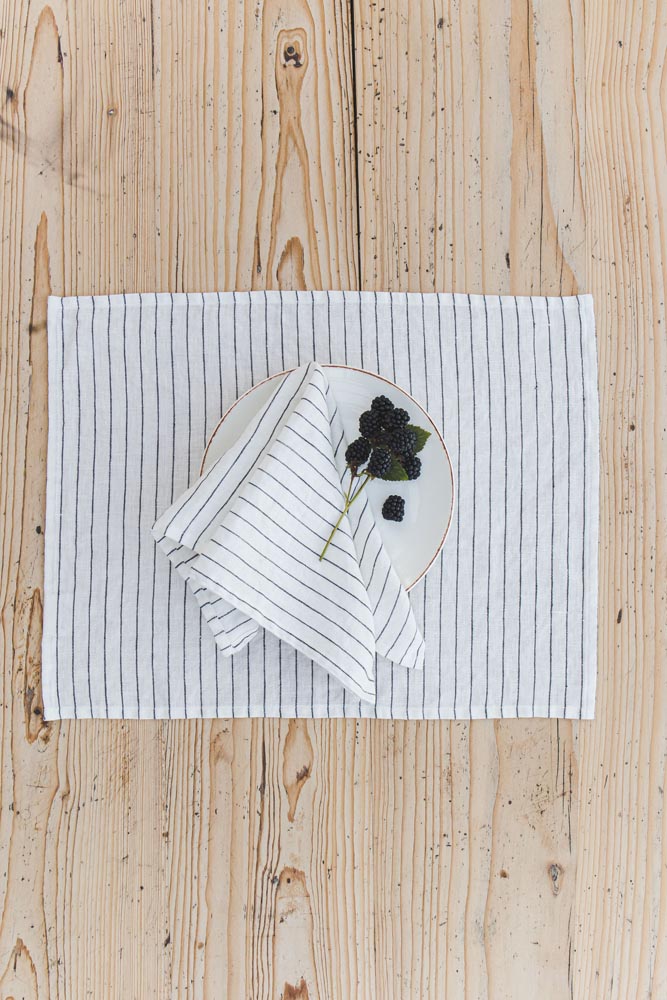 White linen napkins with black stripes