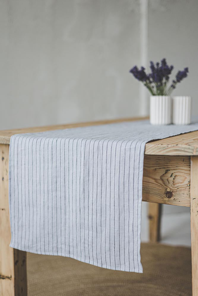 Grey linen table runner with black stripes