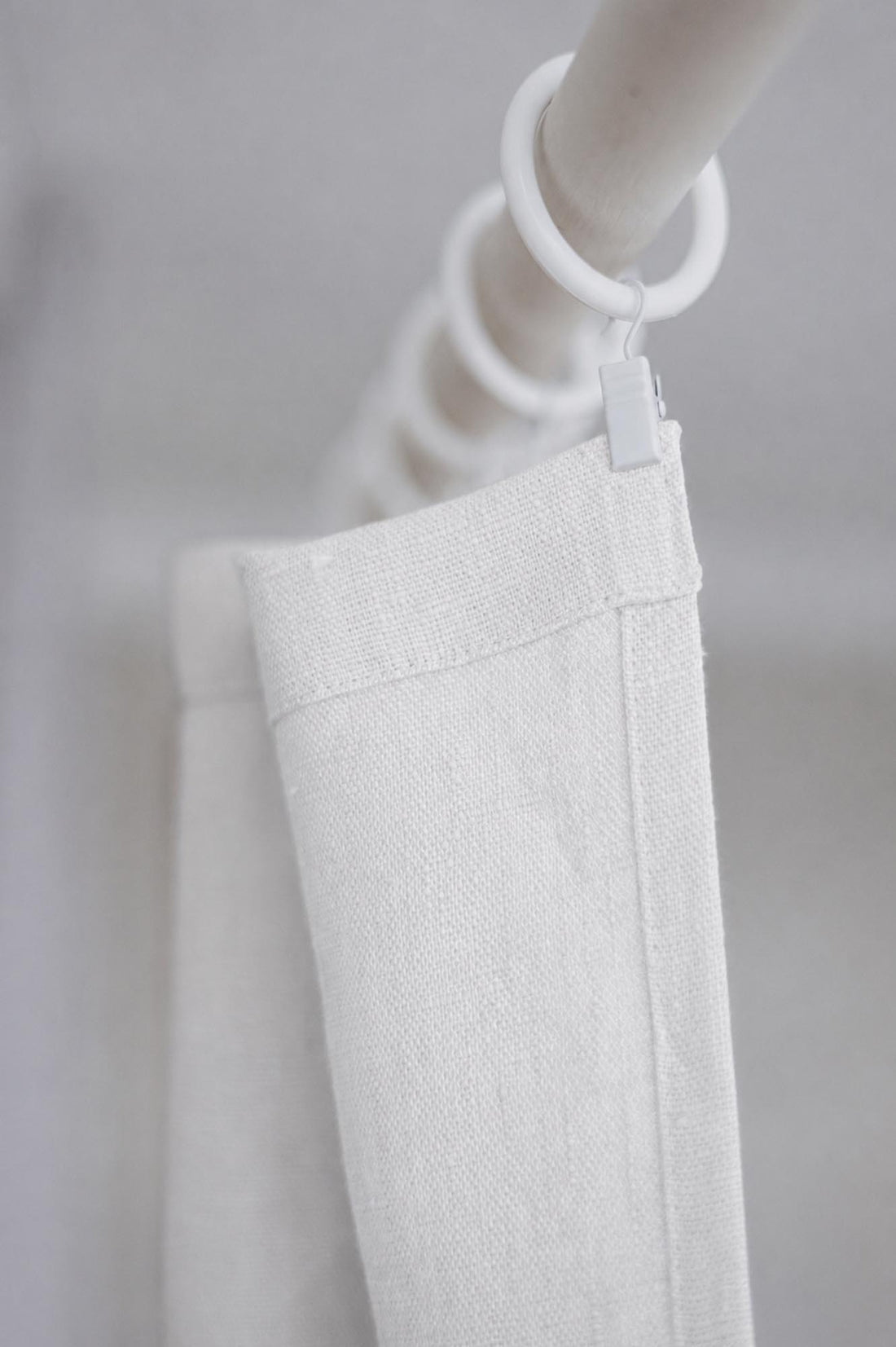 Heavyweight off white linen curtain with simple hem, for clips