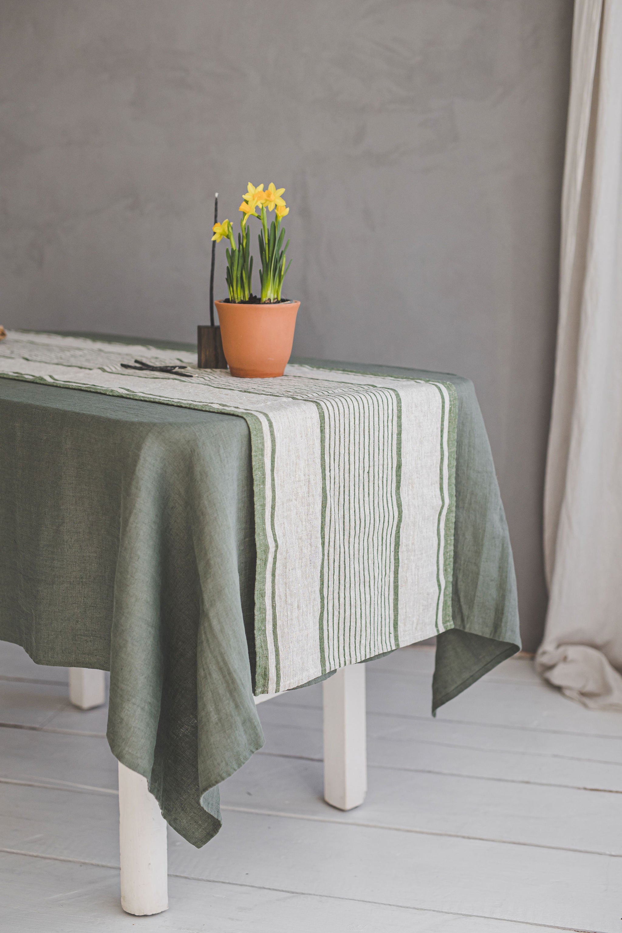 Linen table runner with green stripes