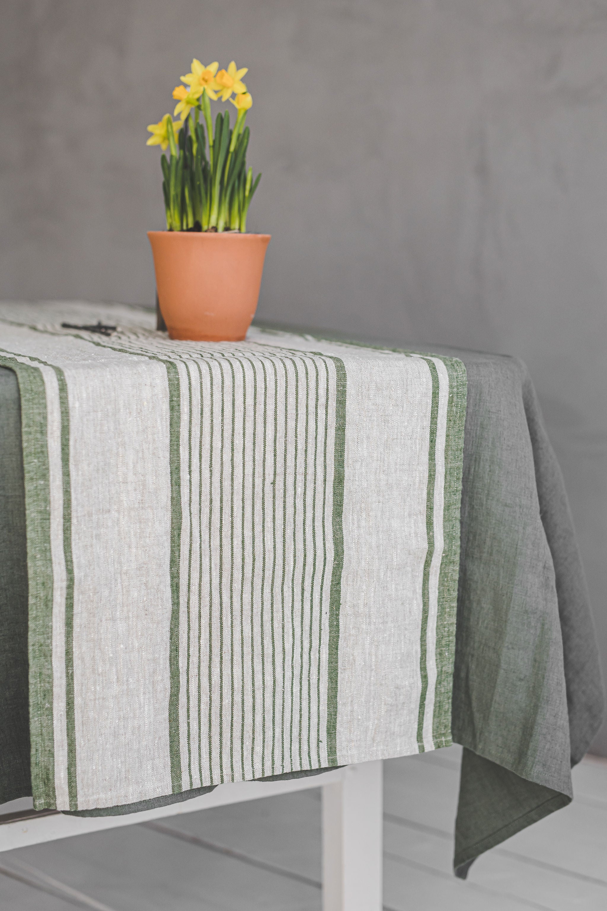 Linen table runner with green stripes