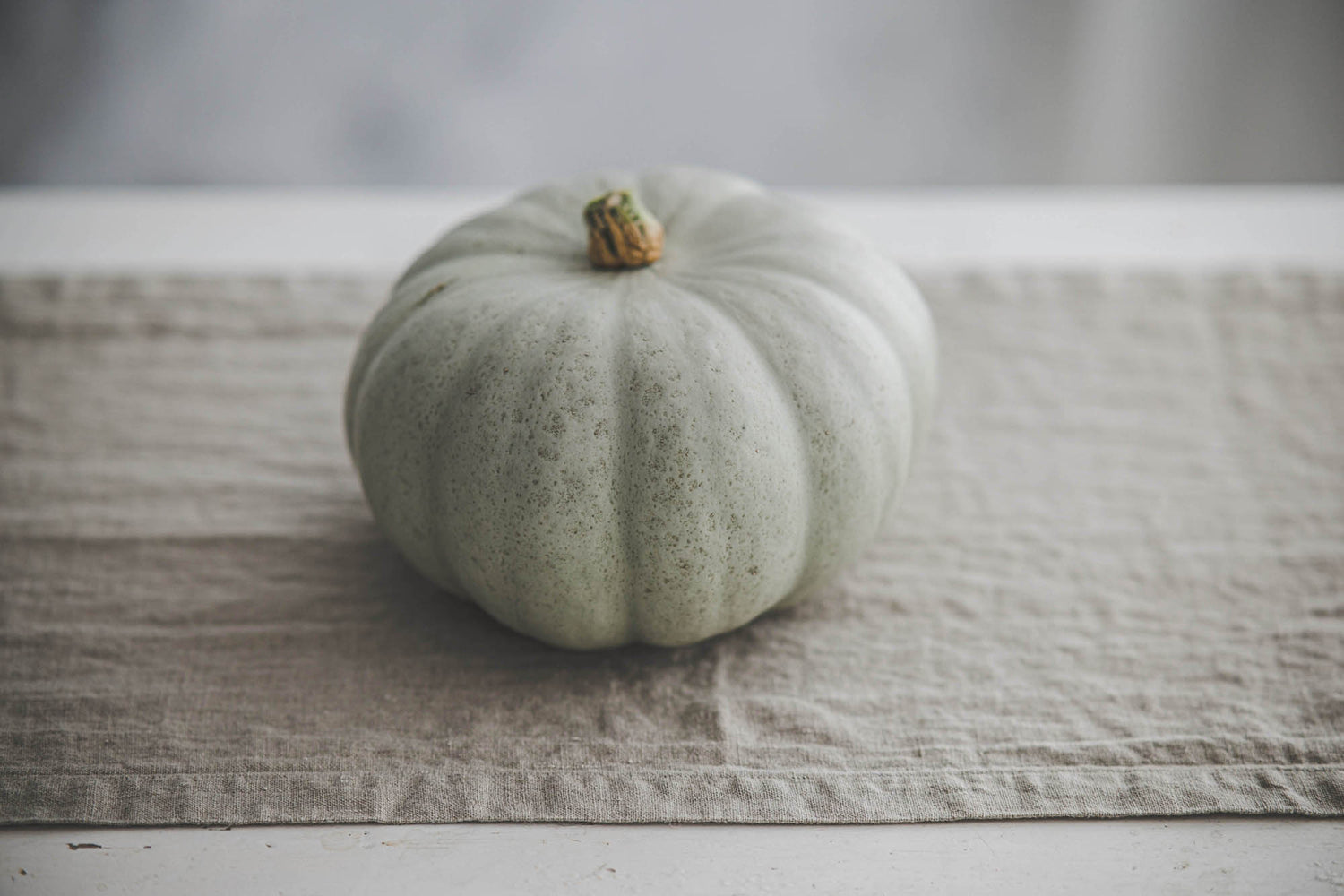 Natural linen table runner with mitered corners