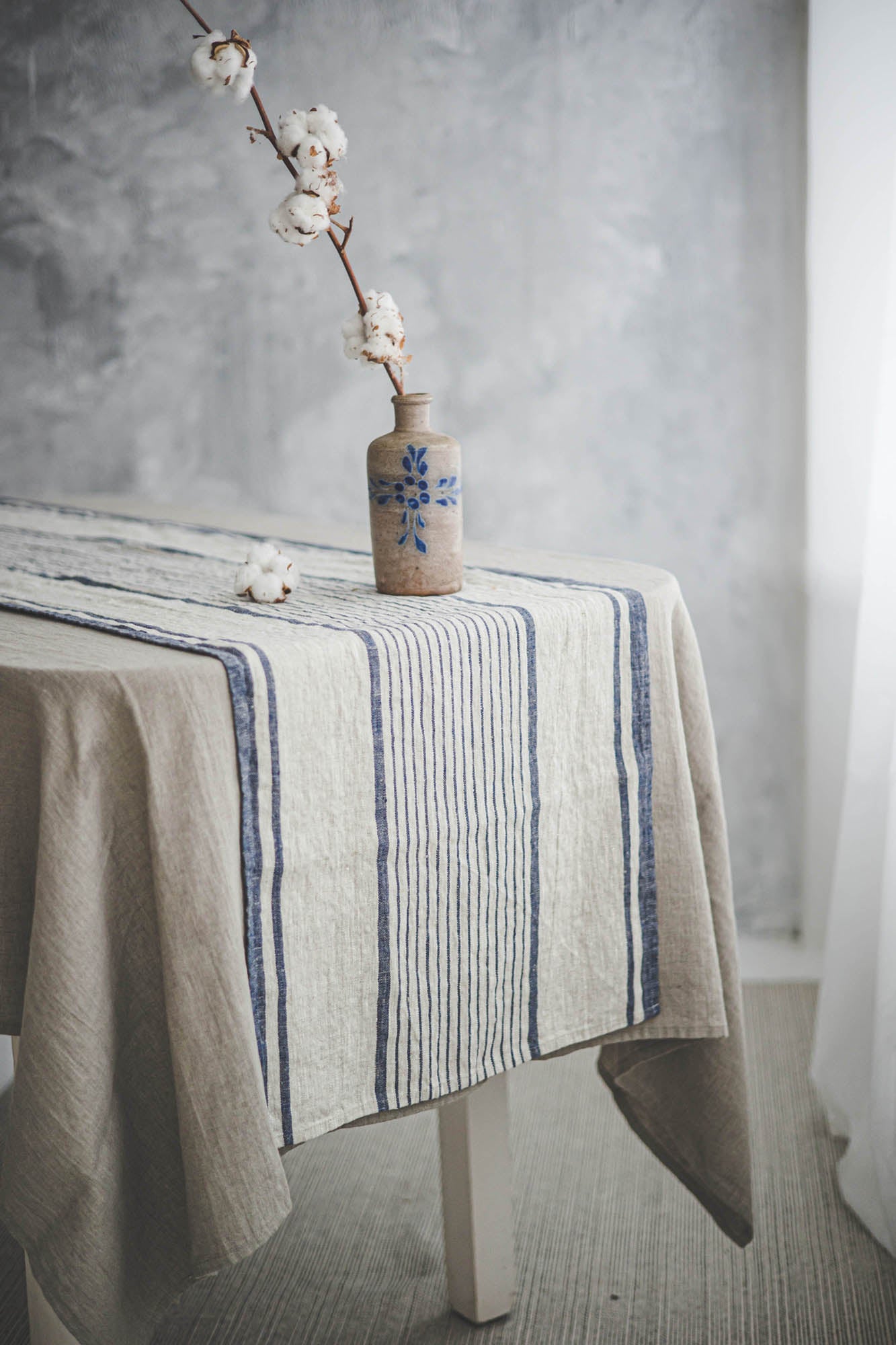Linen table runner with blue stripes