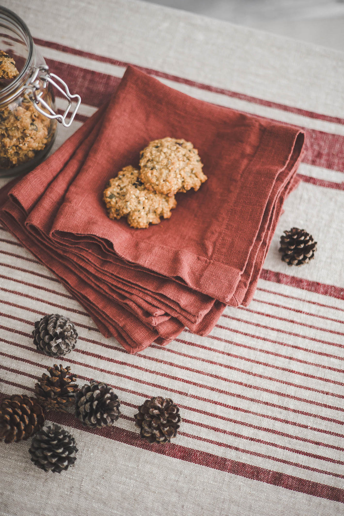 Terracotta linen napkins with mitered corners