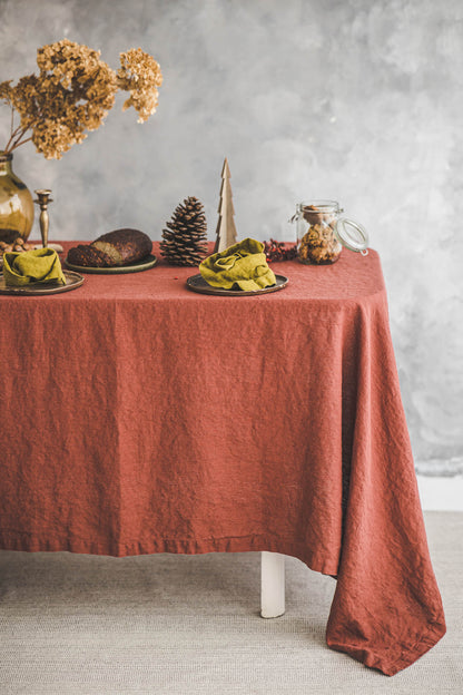 Terracotta linen tablecloth with mitered corners