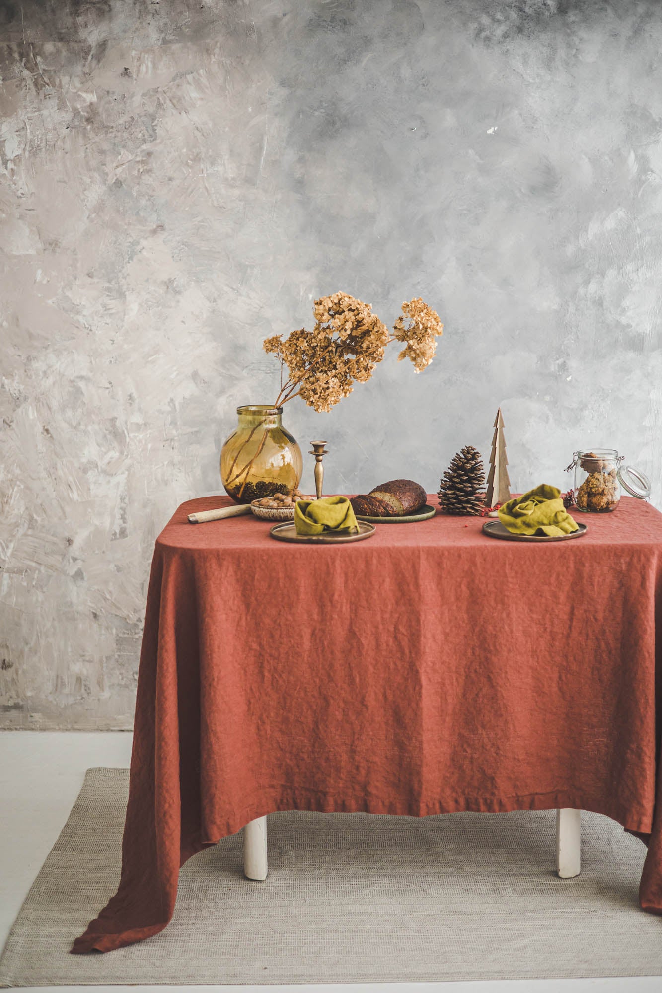 Terracotta linen tablecloth with mitered corners