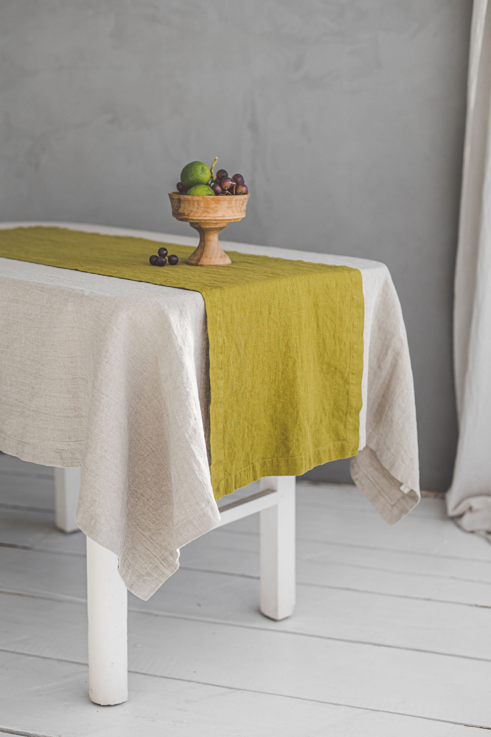 Olive green linen table runner with mitered corners