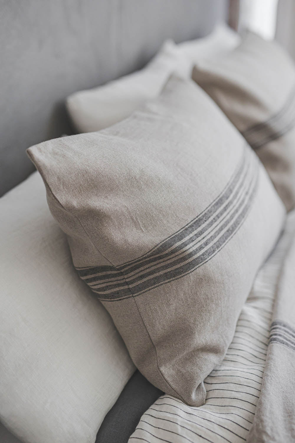 Rustic linen lumbar pillowcase with black stripes