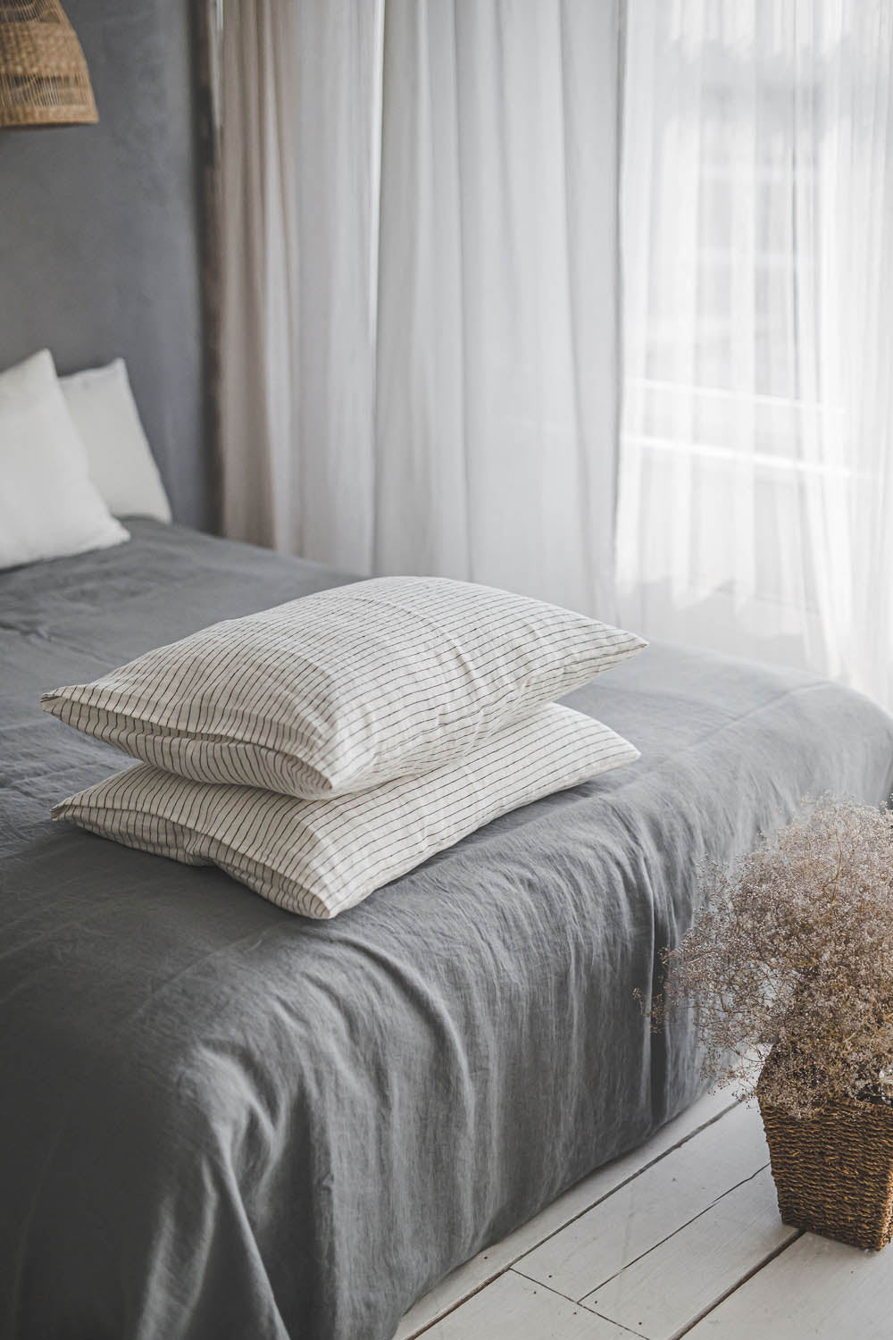 White linen pillowcase with black stripes