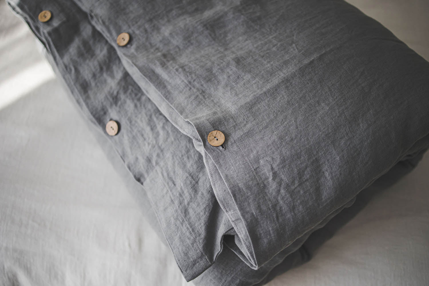 Grey linen duvet cover with buttons