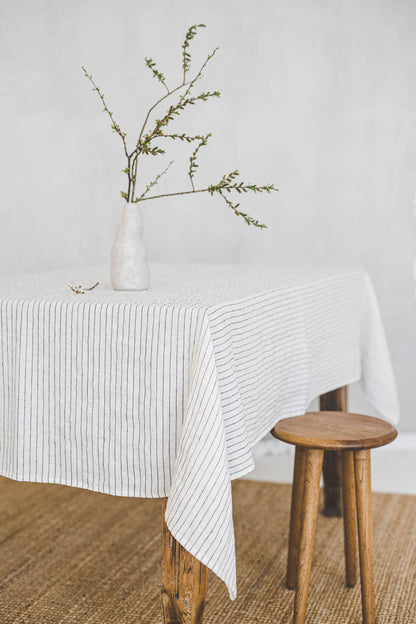 White linen tablecloth with black stripes