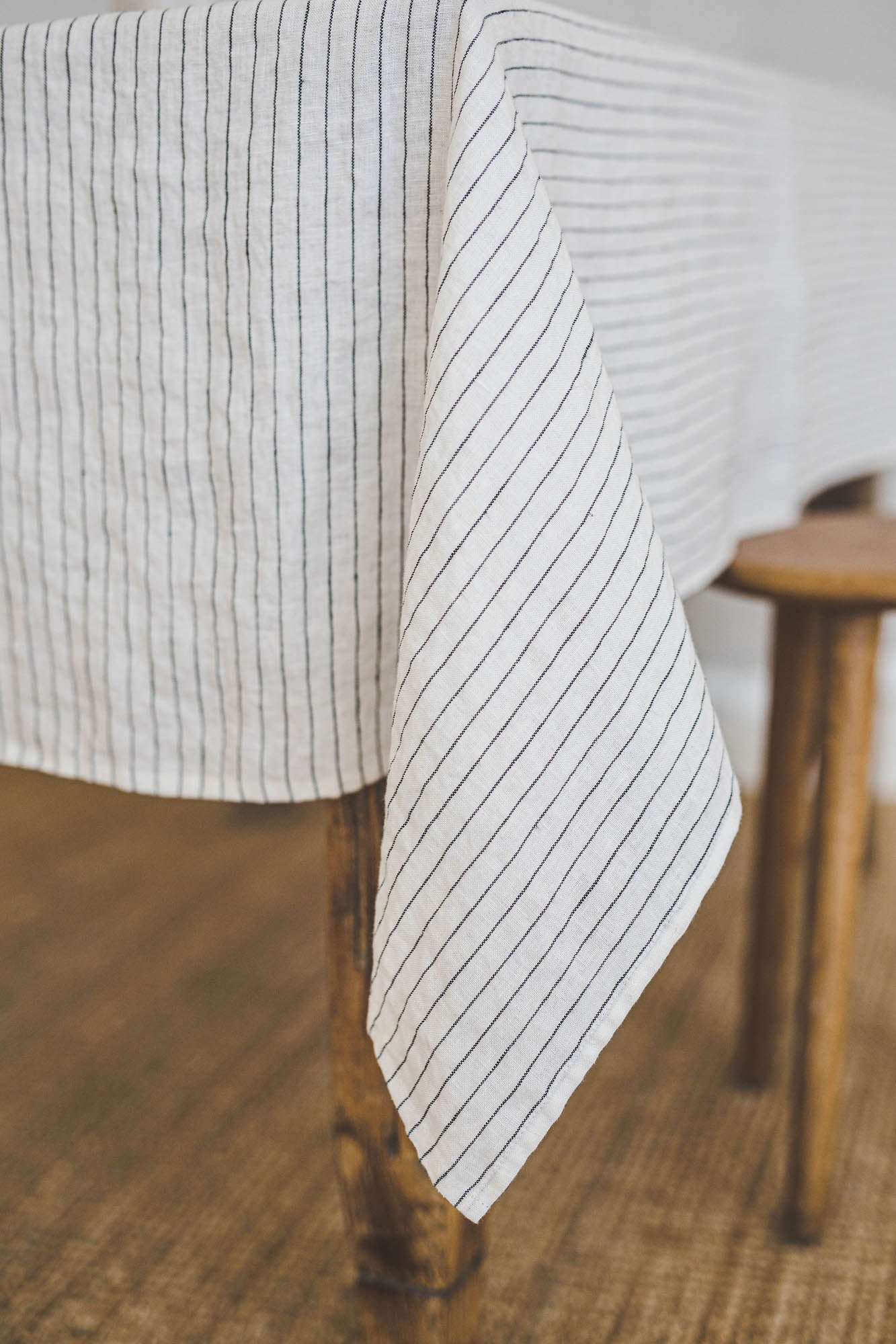 White linen tablecloth with black stripes