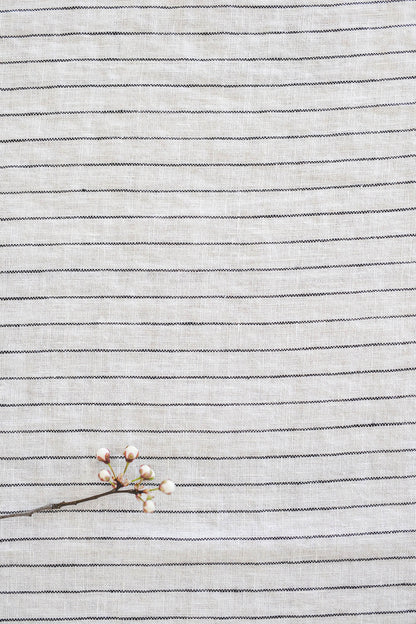 White linen tablecloth with black stripes