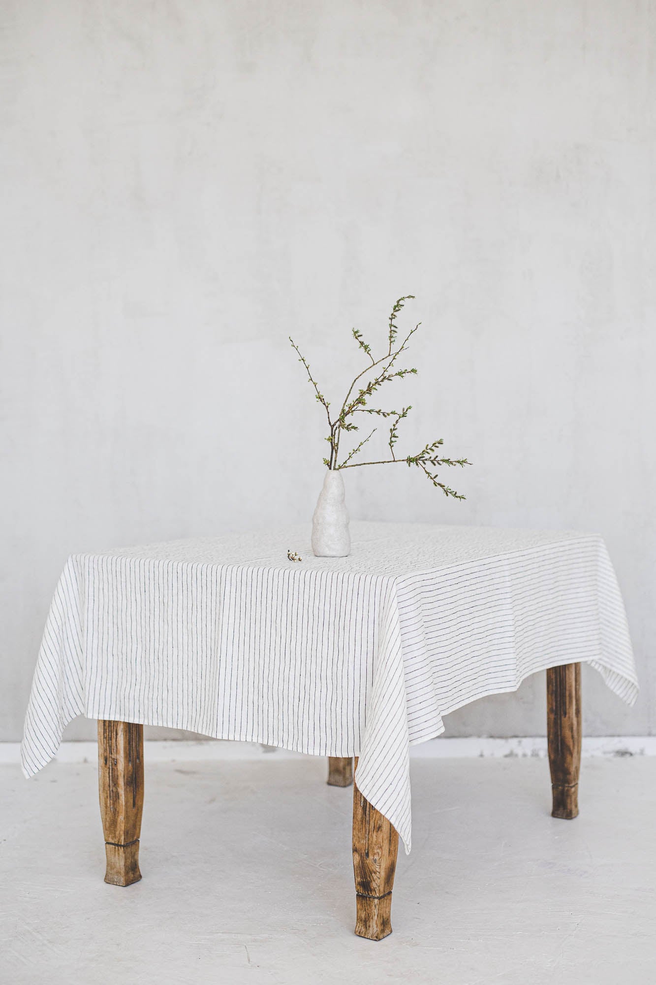 White linen tablecloth with black stripes