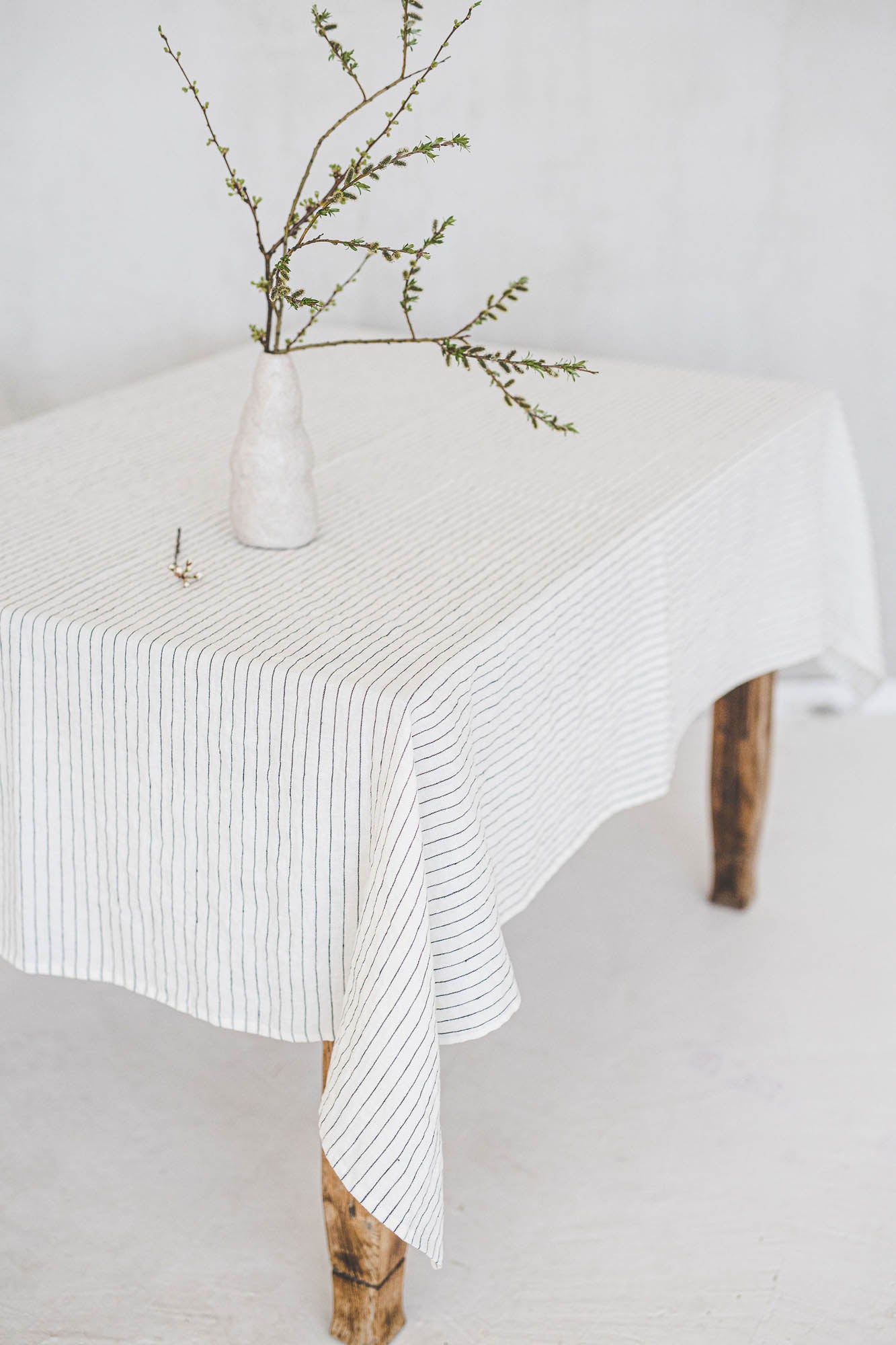 White linen tablecloth with black stripes