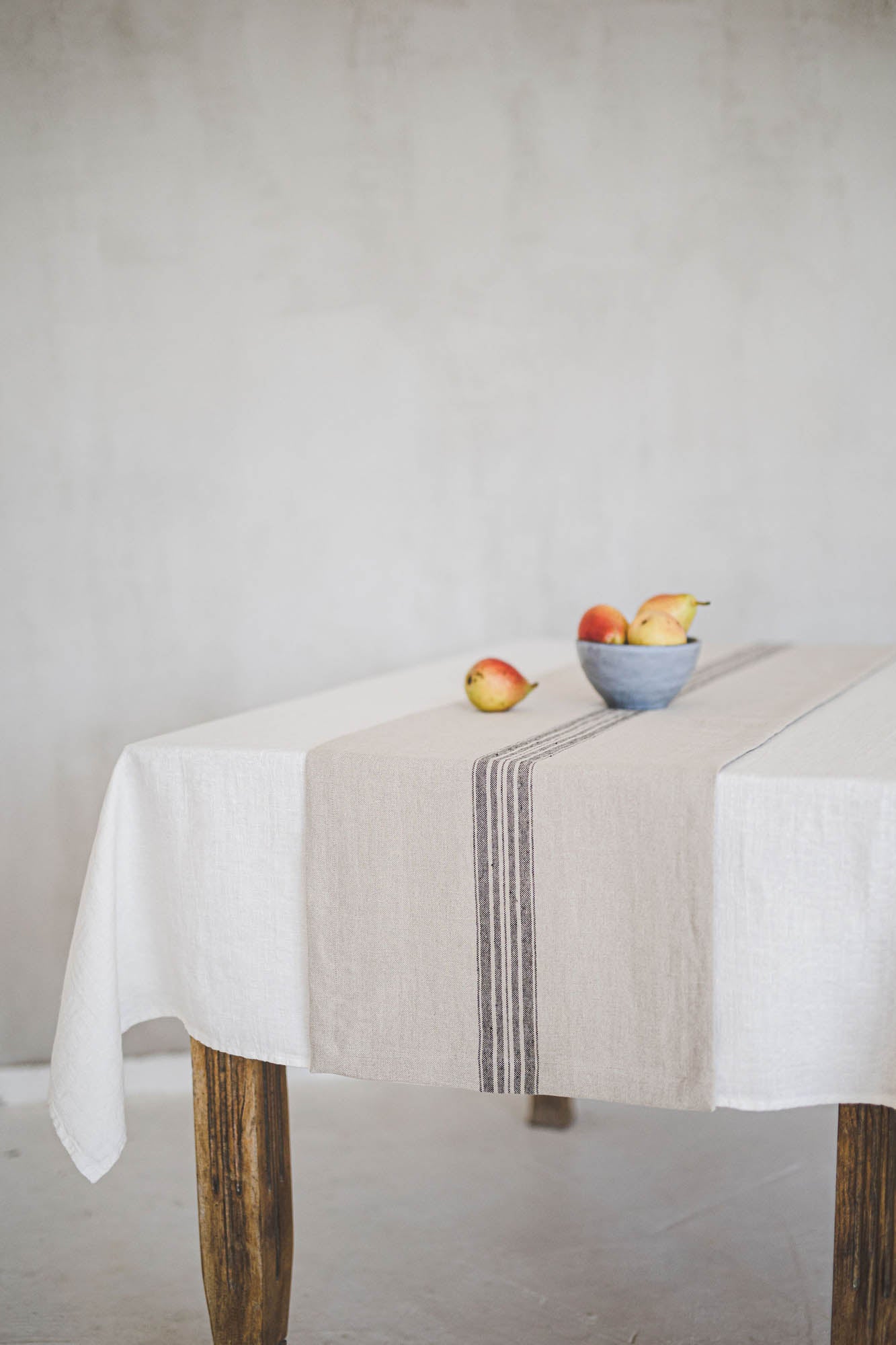 Natural linen table runner with black stripe