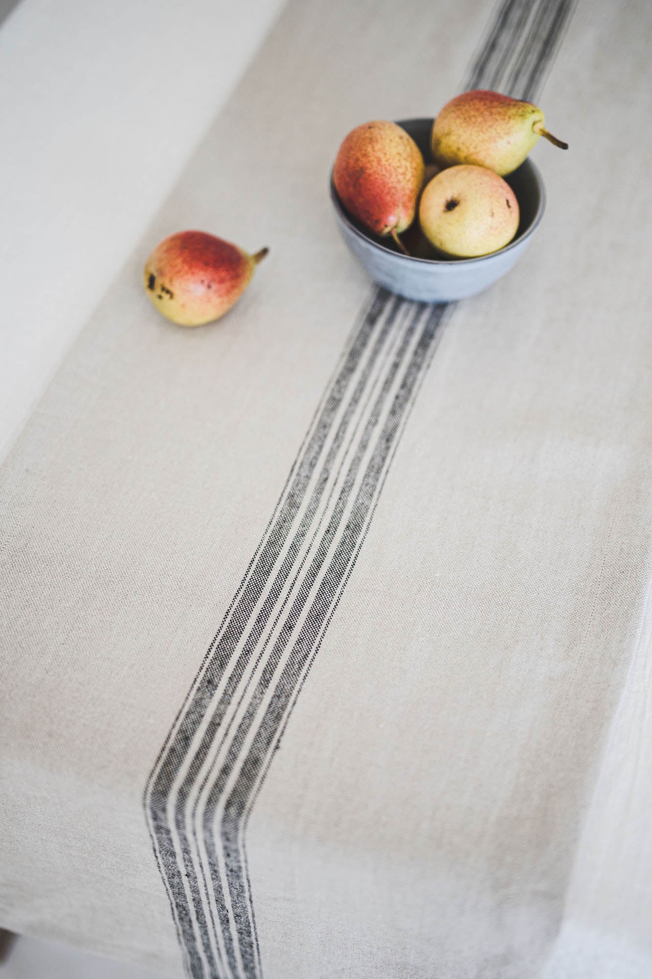 Natural linen table runner with black stripe