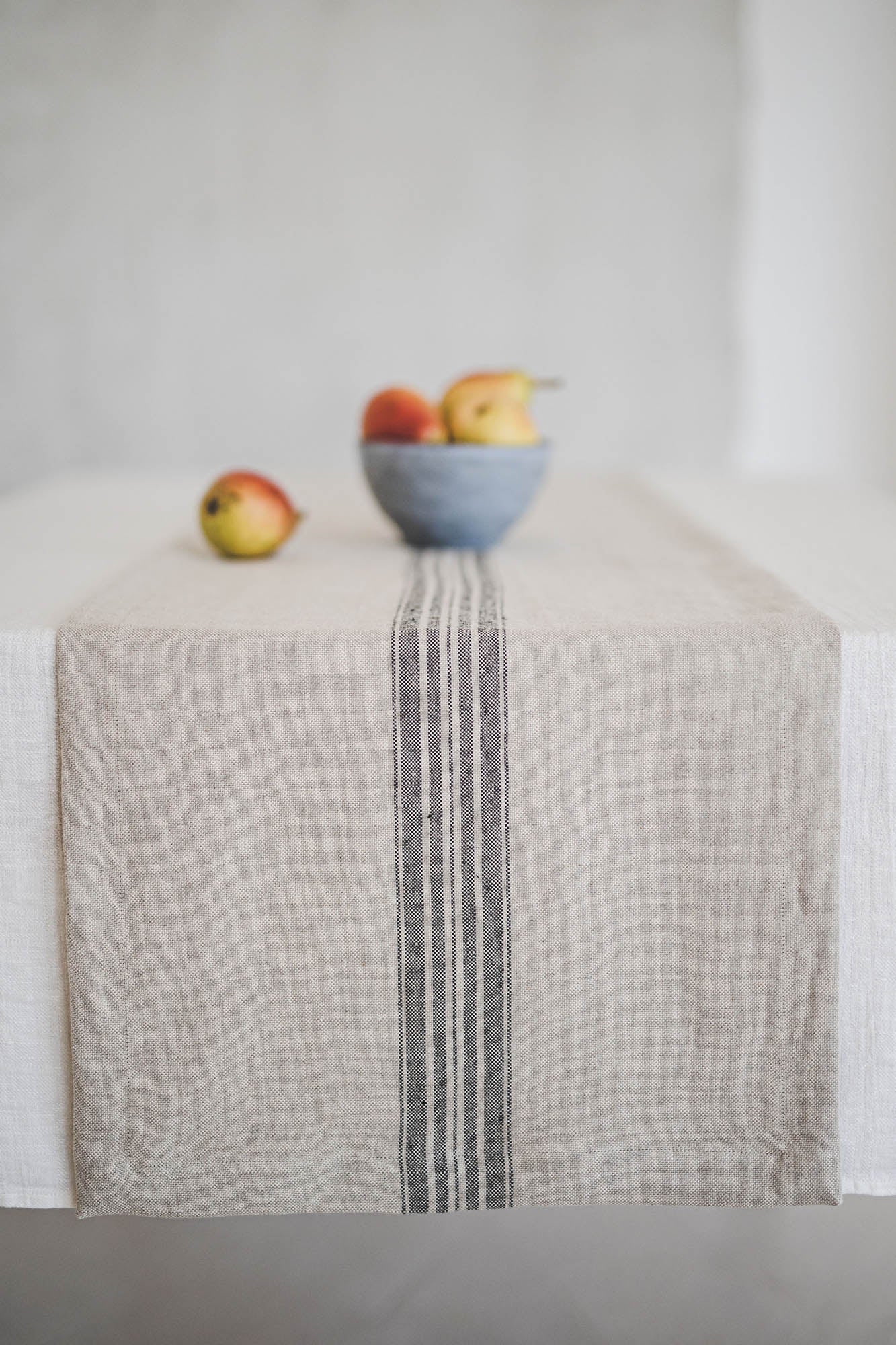 Natural linen table runner with black stripe