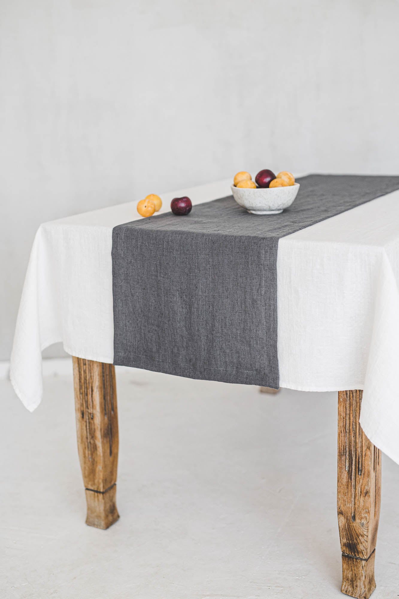 Charcoal gray linen table runner with mitered corners