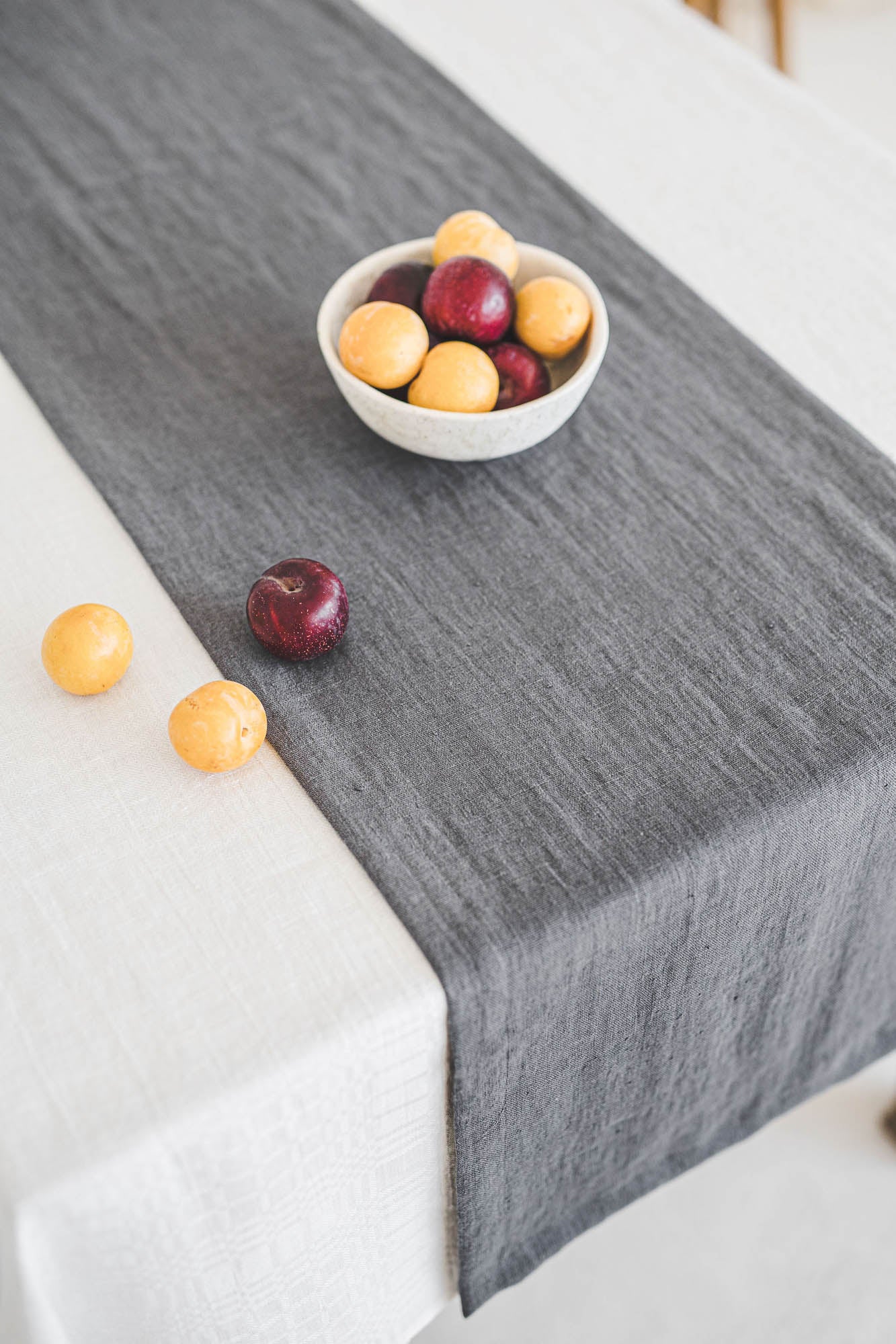 Charcoal gray linen table runner with mitered corners