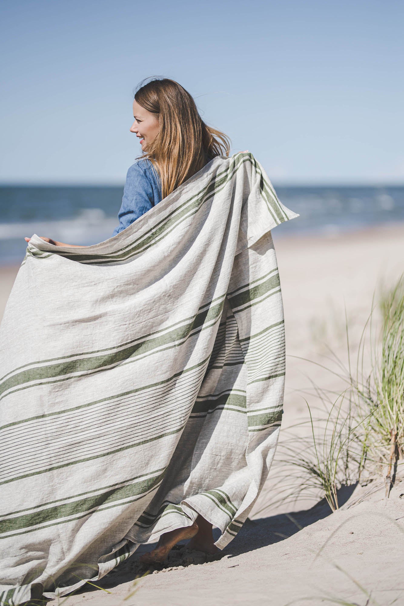 Linen beach towel with green stripes