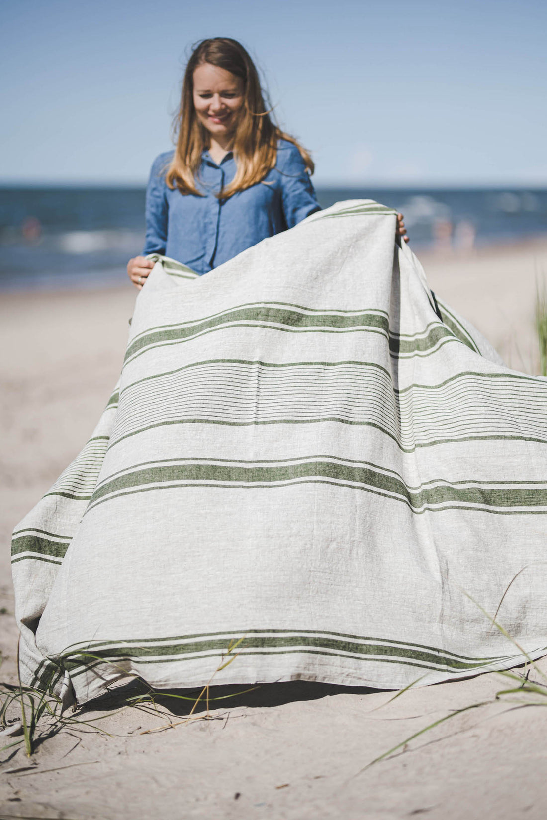 Linen beach towel with green stripes